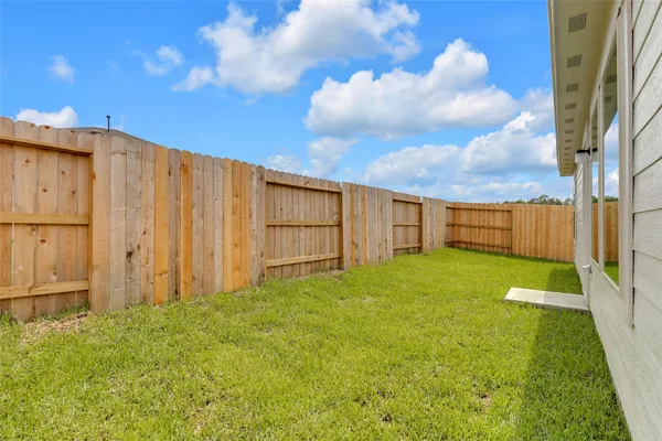 a view of a backyard with a garden