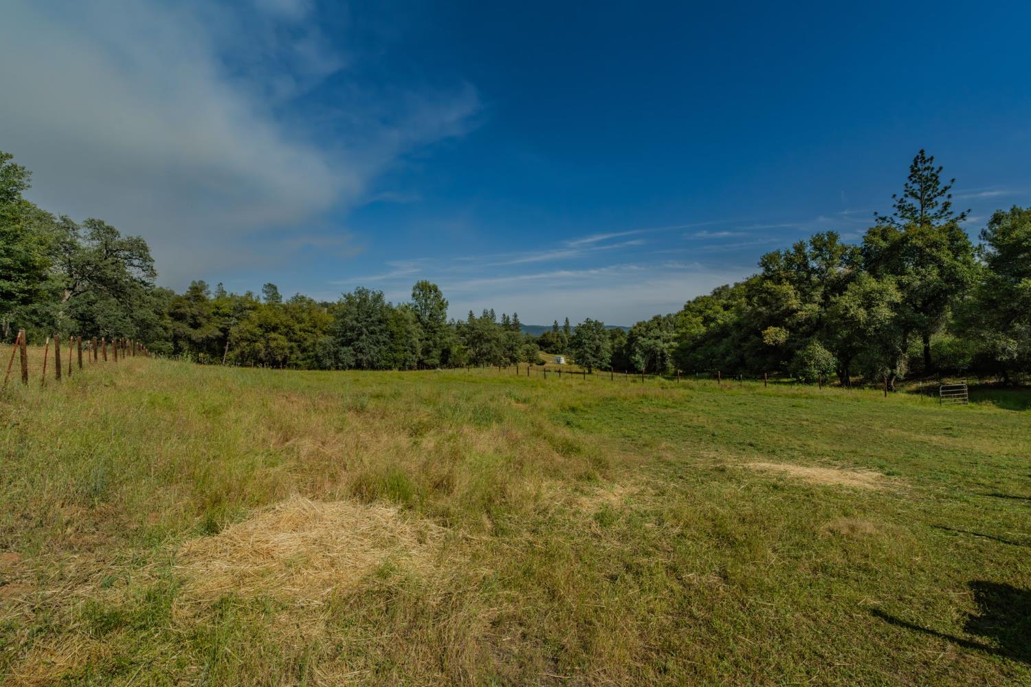 6216 Trout Lane Mountain Ranch, CA 95246 - Photo 24 of 39 a view of a lake with houses in the background