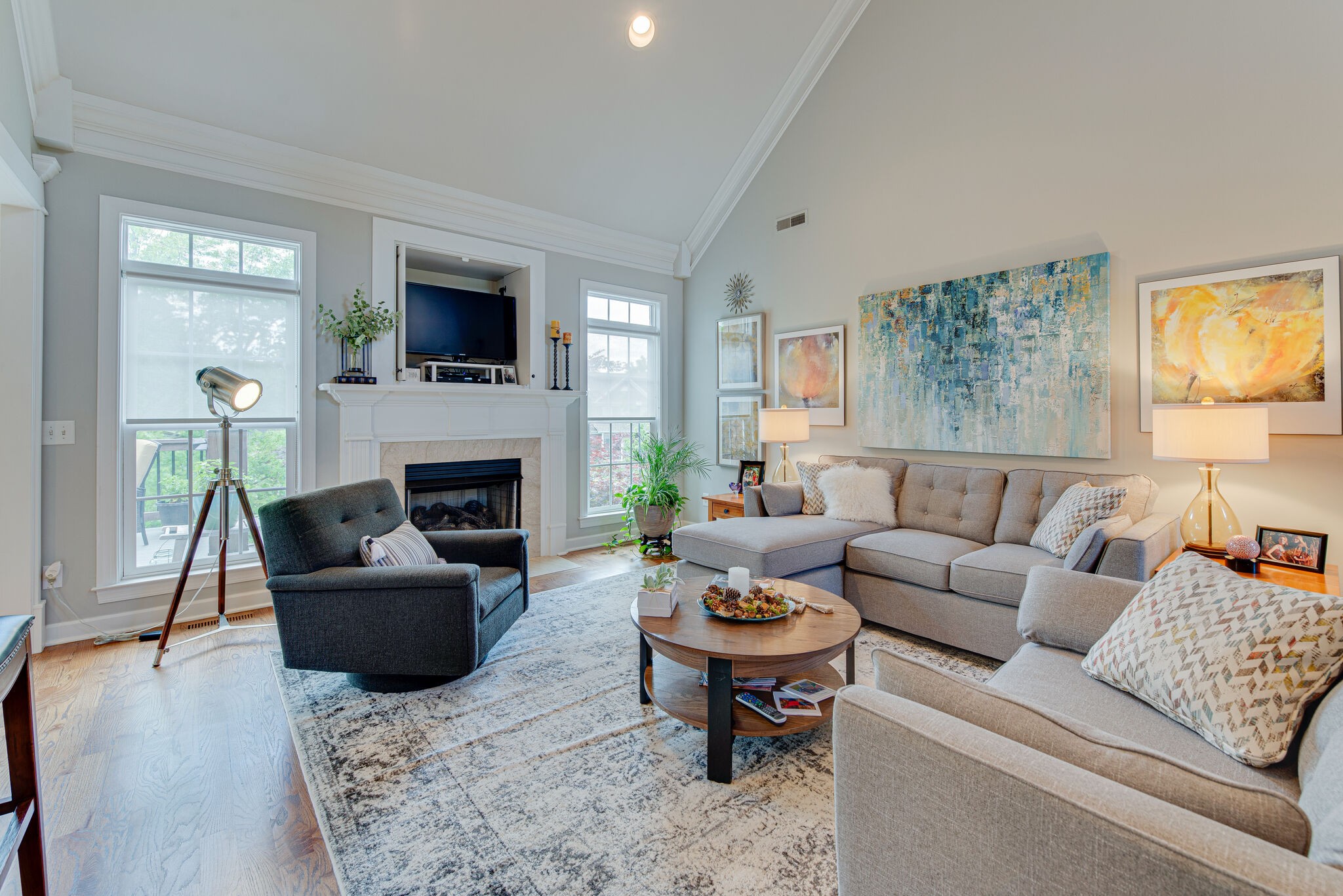 1027 Red Pepper Ridge Spring Hill, TN 37174 - Photo 12 of 38 a living room with furniture flat screen tv and a fireplace