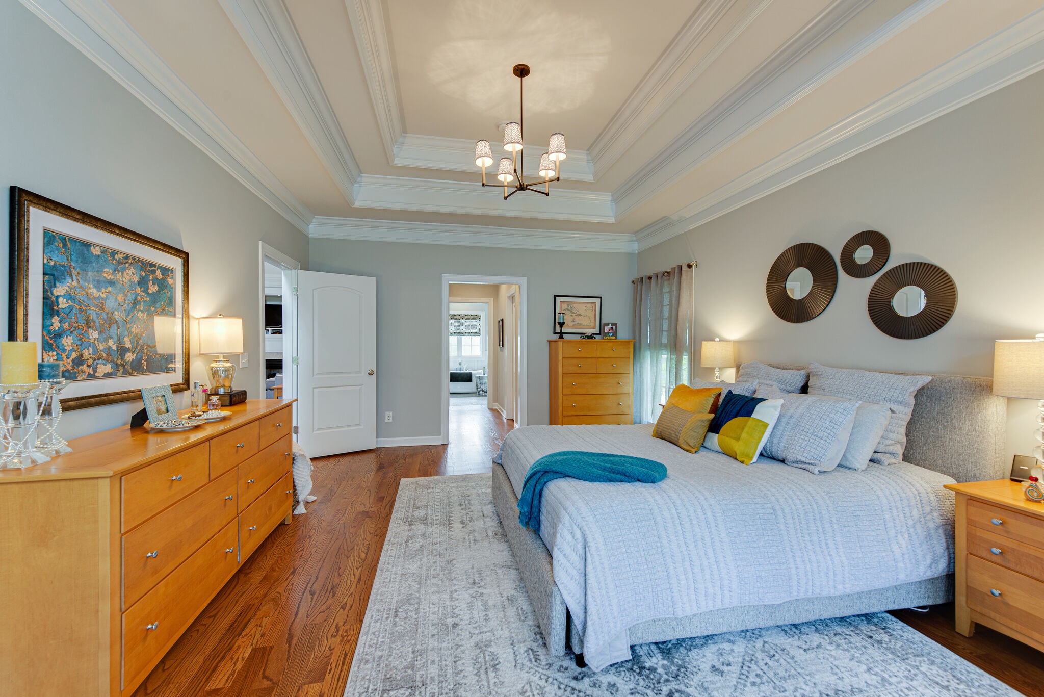 1027 Red Pepper Ridge Spring Hill, TN 37174 - Photo 16 of 38 a bedroom with bed and a chandelier