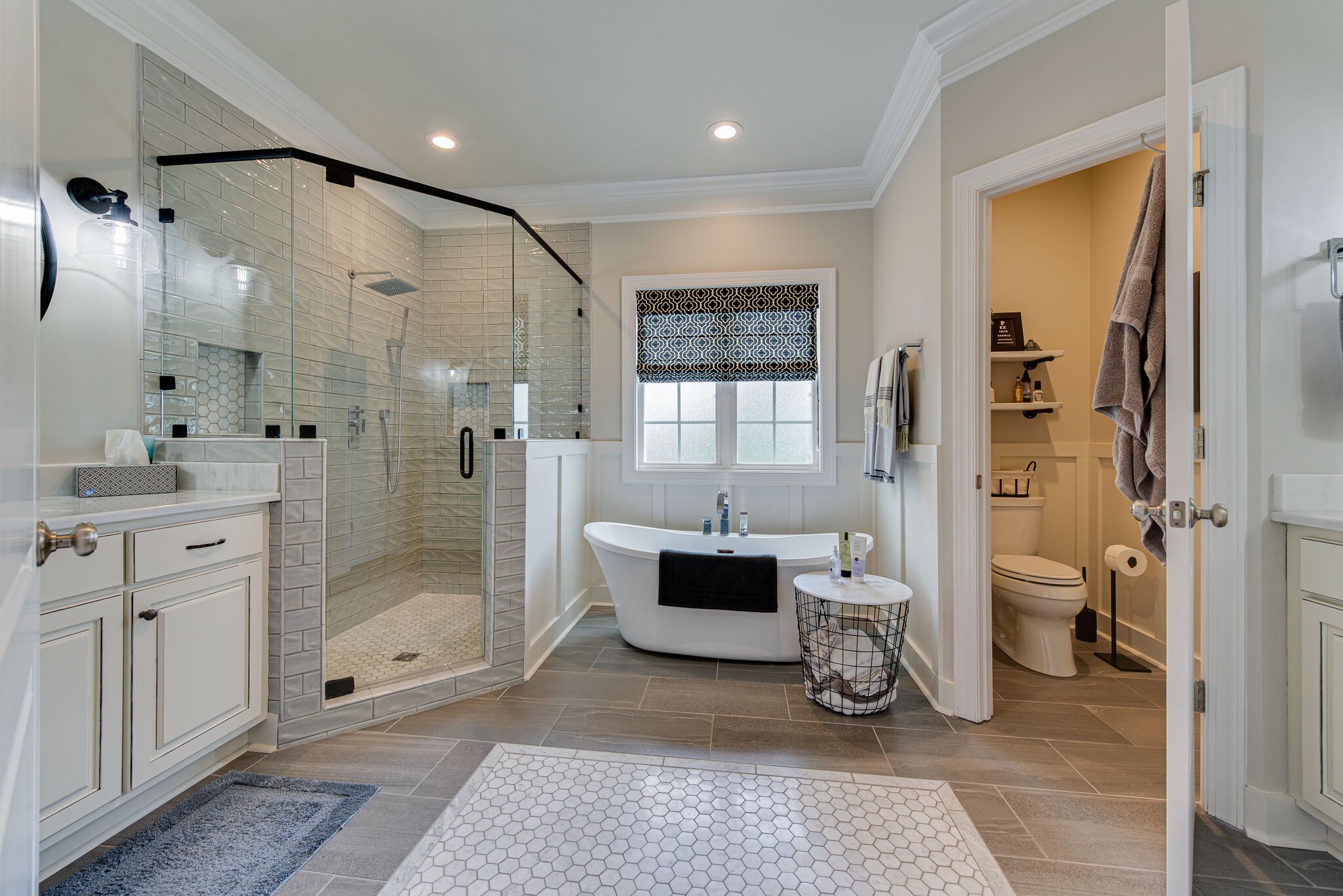 1027 Red Pepper Ridge Spring Hill, TN 37174 - Photo 17 of 38 a bathroom with a double vanity sink toilet and shower