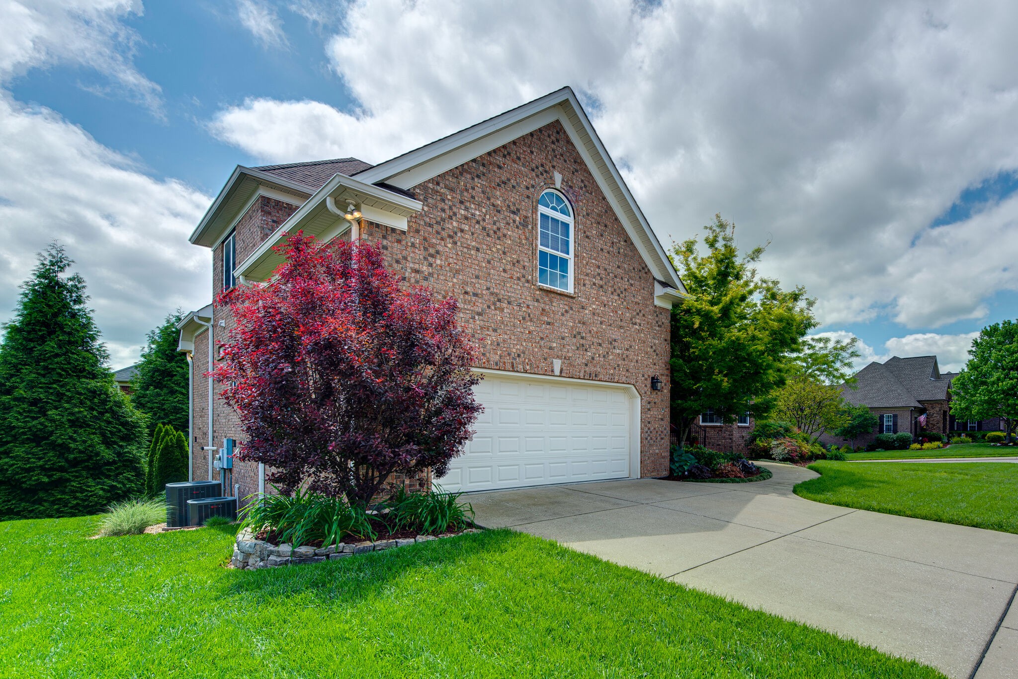 1027 Red Pepper Ridge Spring Hill, TN 37174 - Photo 3 of 38 a front view of house with garden