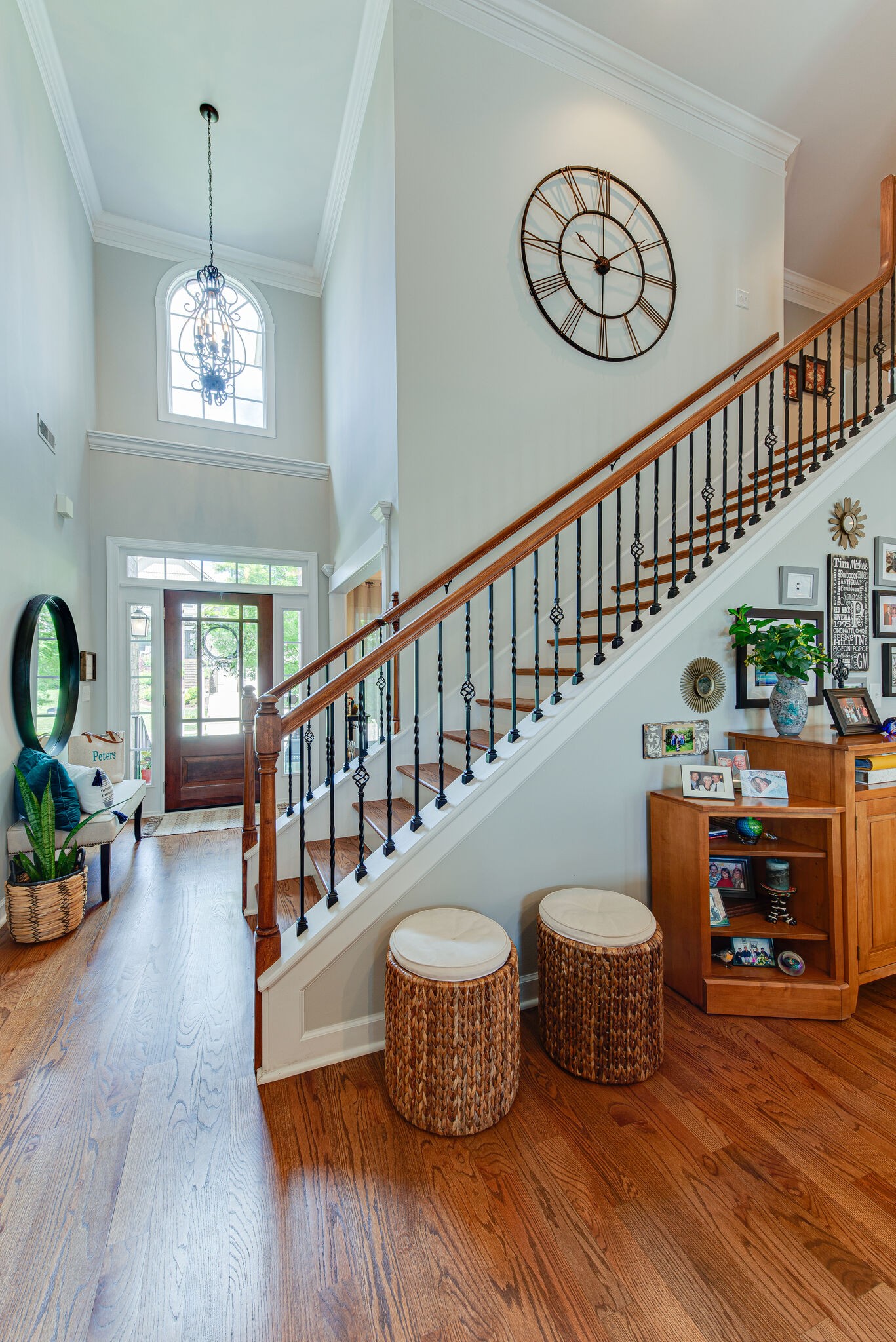 1027 Red Pepper Ridge Spring Hill, TN 37174 - Photo 24 of 38 a living room with furniture a dining table and a chandelier