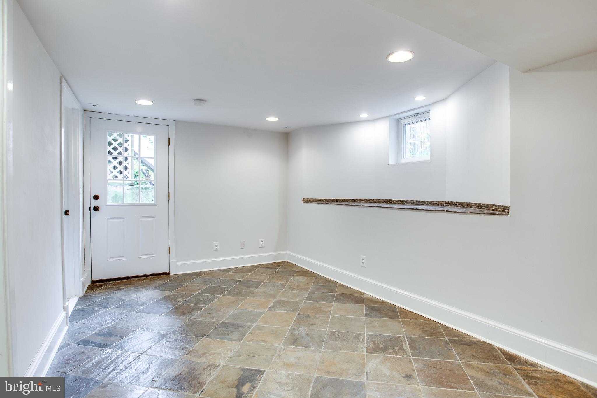 1414 Foxhall Road Northwest Washington, DC 20007 - Photo 21 of 25 Lower level with windows
