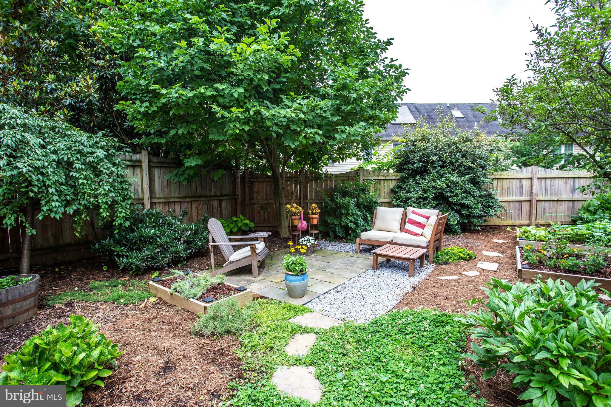 1414 Foxhall Road Northwest Washington, DC 20007 - Photo 24 of 25 Backyard with raised beds