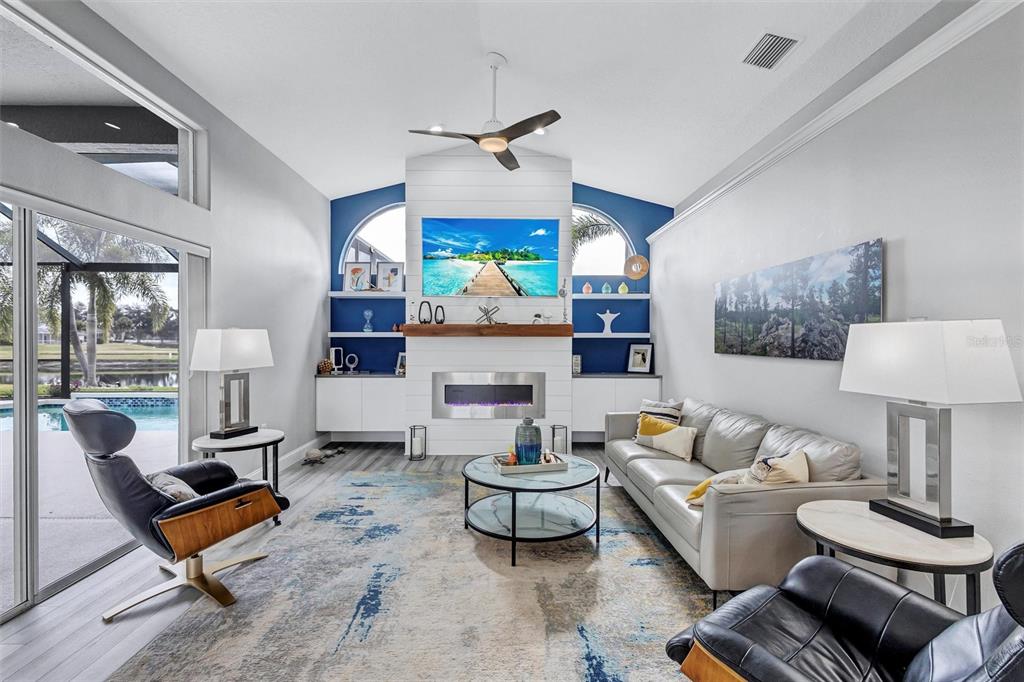 8409 29th Street East Parrish, FL 34219 - Photo 22 of 65 a living room with furniture and a table