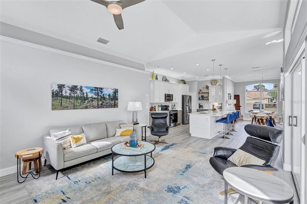 8409 29th Street East Parrish, FL 34219 - Photo 24 of 65 a living room with furniture and a table