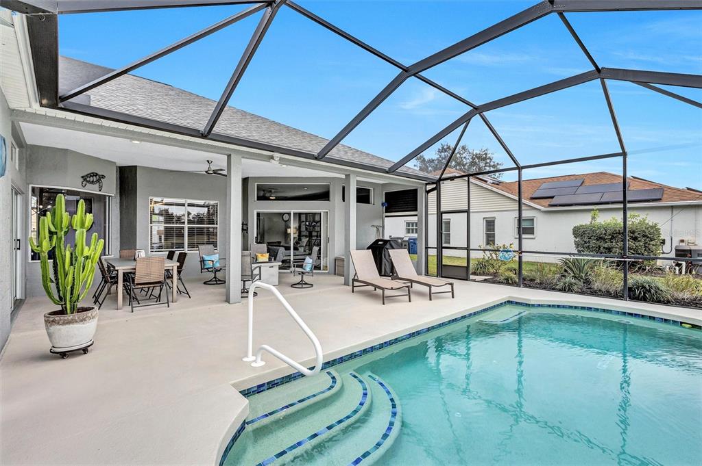 8409 29th Street East Parrish, FL 34219 - Photo 40 of 65 a view of a backyard with swimming pool