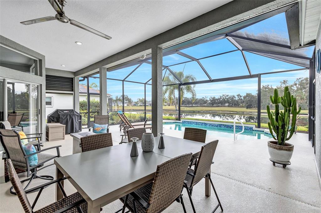 8409 29th Street East Parrish, FL 34219 - Photo 43 of 65 a dining room with furniture window and outside view