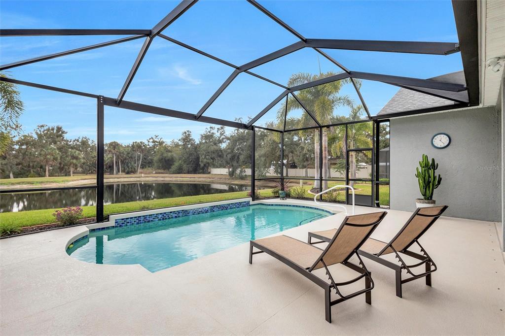 8409 29th Street East Parrish, FL 34219 - Photo 45 of 65 a view of swimming pool with sitting area
