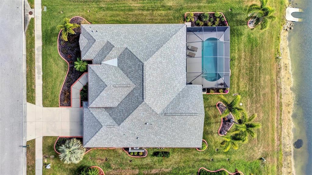 8409 29th Street East Parrish, FL 34219 - Photo 47 of 65 an aerial view of a house with a yard