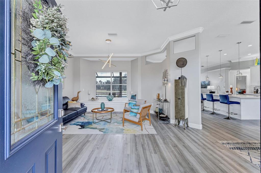 8409 29th Street East Parrish, FL 34219 - Photo 7 of 65 a living room with furniture and a large window