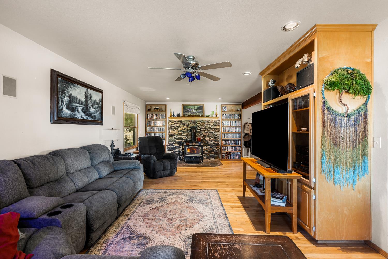 3206 Gillam Road Valley Springs, CA 95252 - Photo 13 of 44 a living room with furniture and a flat screen tv