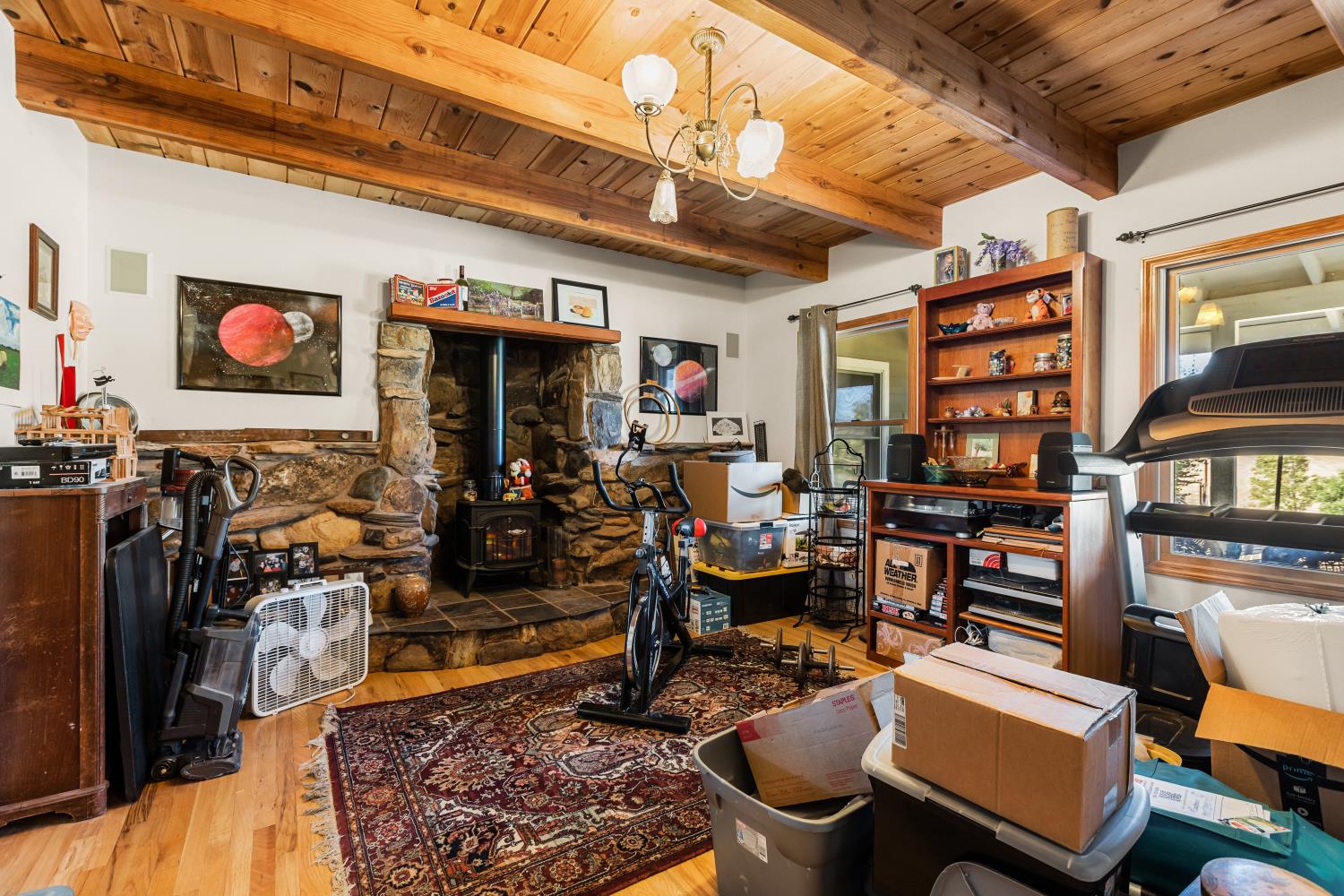 3206 Gillam Road Valley Springs, CA 95252 - Photo 14 of 44 a view of a room with guitars and wooden floor