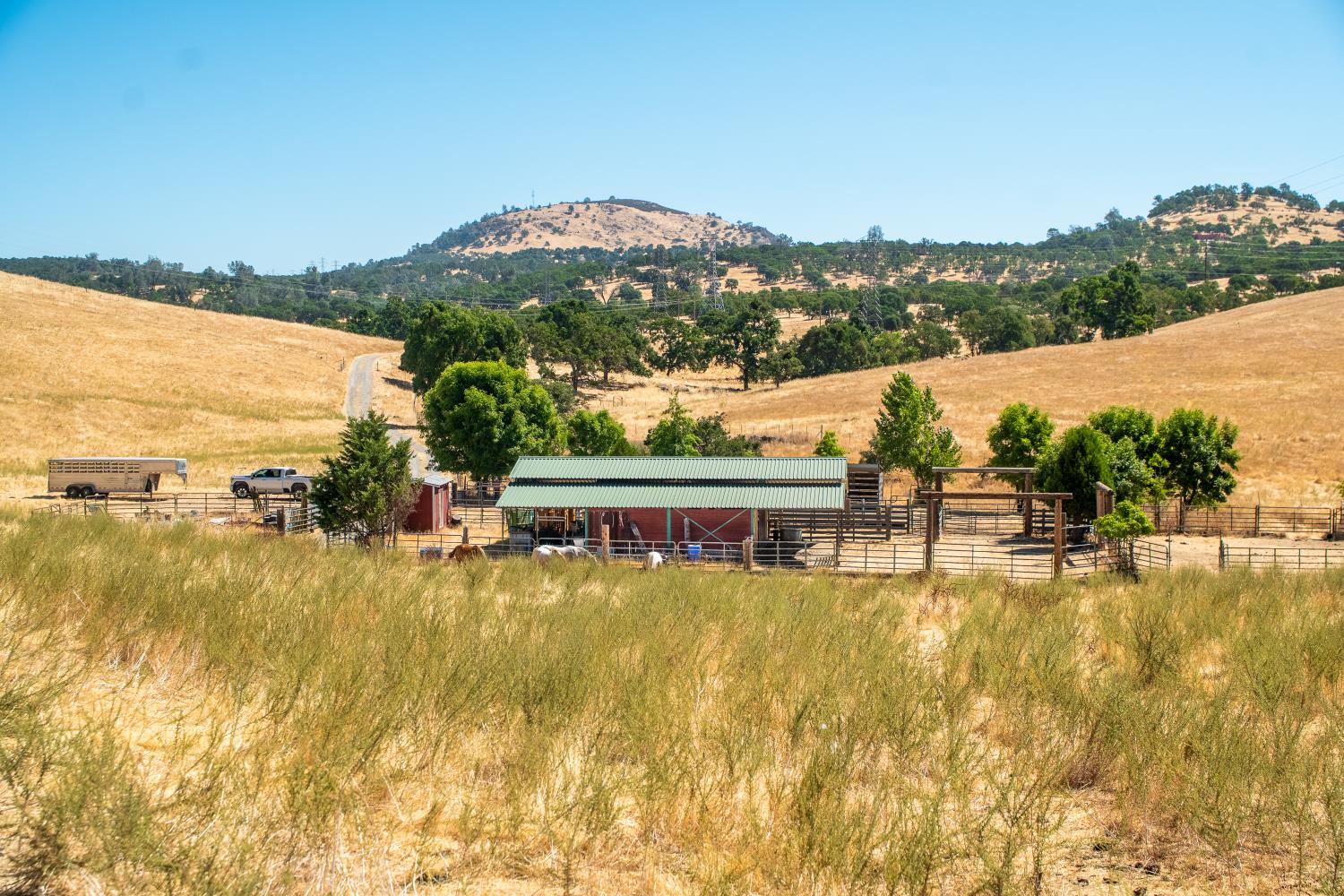 3206 Gillam Road Valley Springs, CA 95252 - Photo 32 of 44 a view of a lake with a mountain in the background