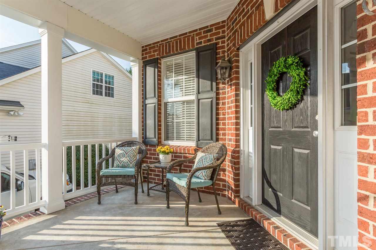 8609 Benzinger Drive Raleigh, NC 27613 - Photo 3 of 25 a balcony view with a outdoor seating space