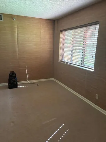 a view of a door with wooden floor