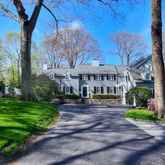 a view of a building with a yard
