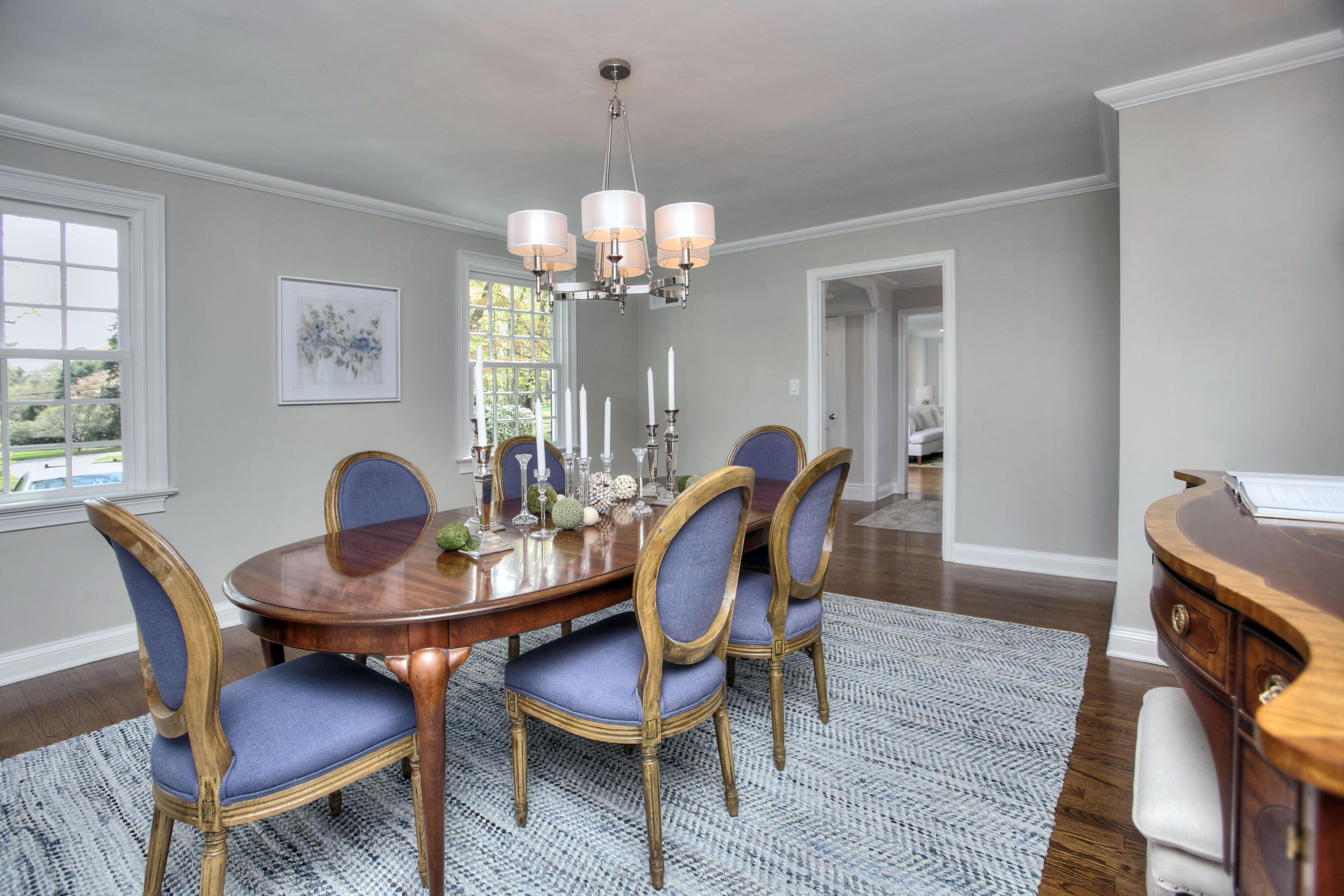25 Point O Woods Road Darien, CT 06820 - Photo 11 of 68 a view of a dining room with furniture and wooden floor