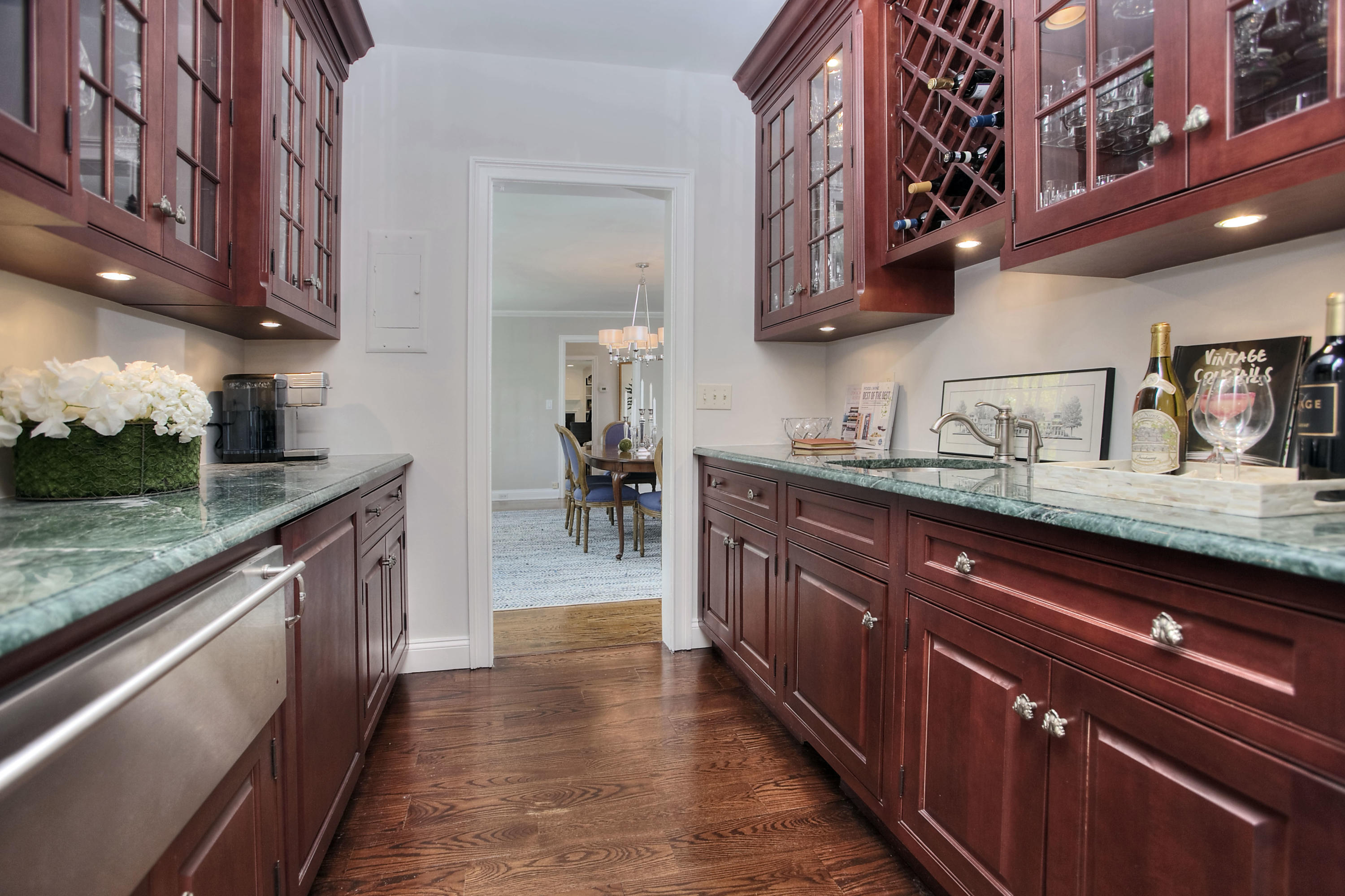 25 Point O Woods Road Darien, CT 06820 - Photo 13 of 68 a kitchen with stainless steel appliances granite countertop a sink stove and cabinets