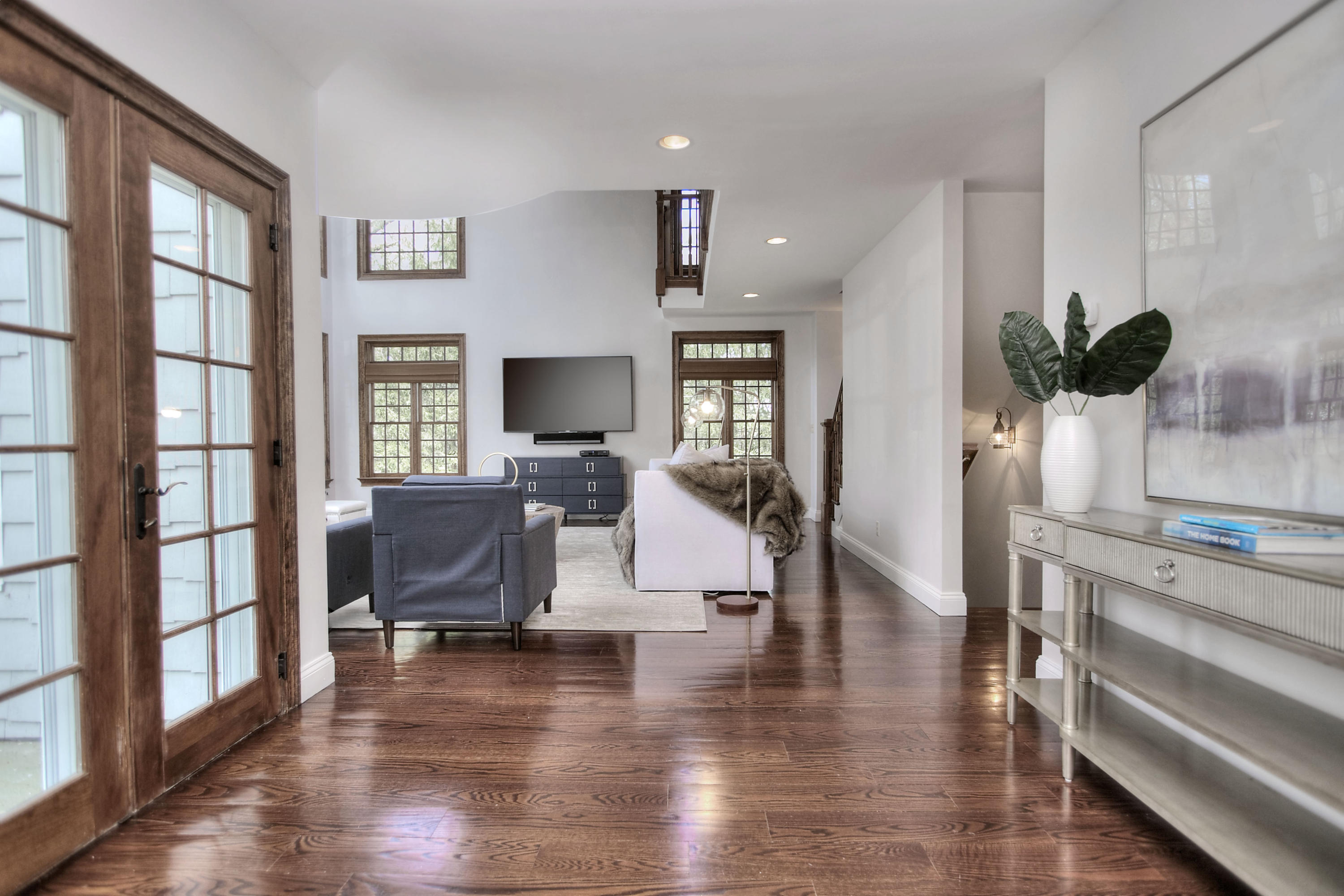 25 Point O Woods Road Darien, CT 06820 - Photo 19 of 68 a living room with furniture and a flat screen tv