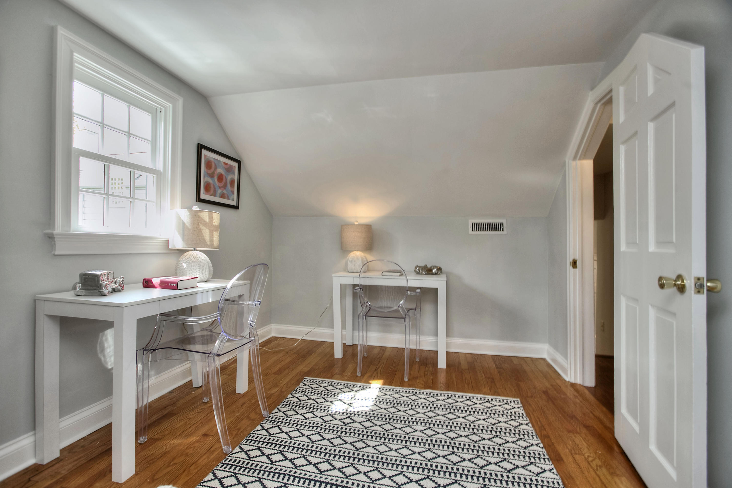 25 Point O Woods Road Darien, CT 06820 - Photo 31 of 68 a room that has a couch and a table in it