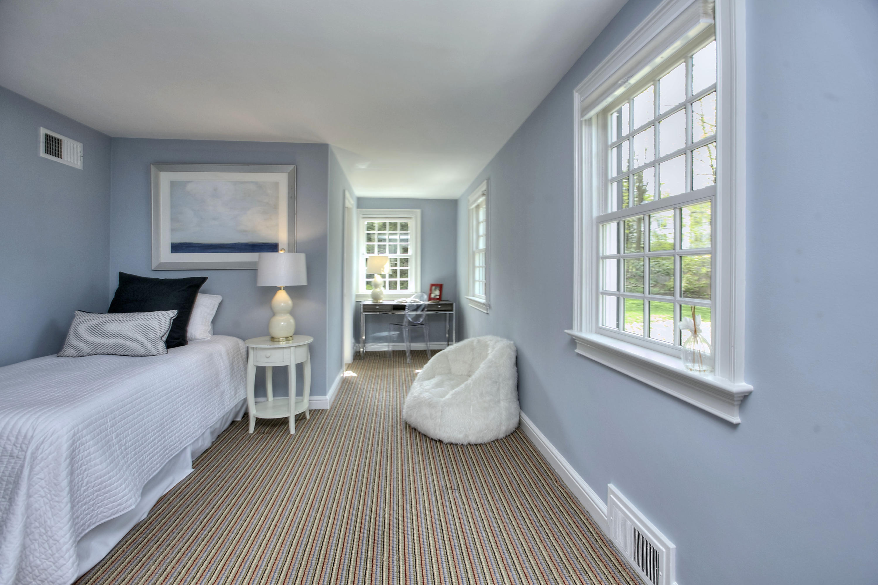 25 Point O Woods Road Darien, CT 06820 - Photo 33 of 68 a bedroom with bed and window