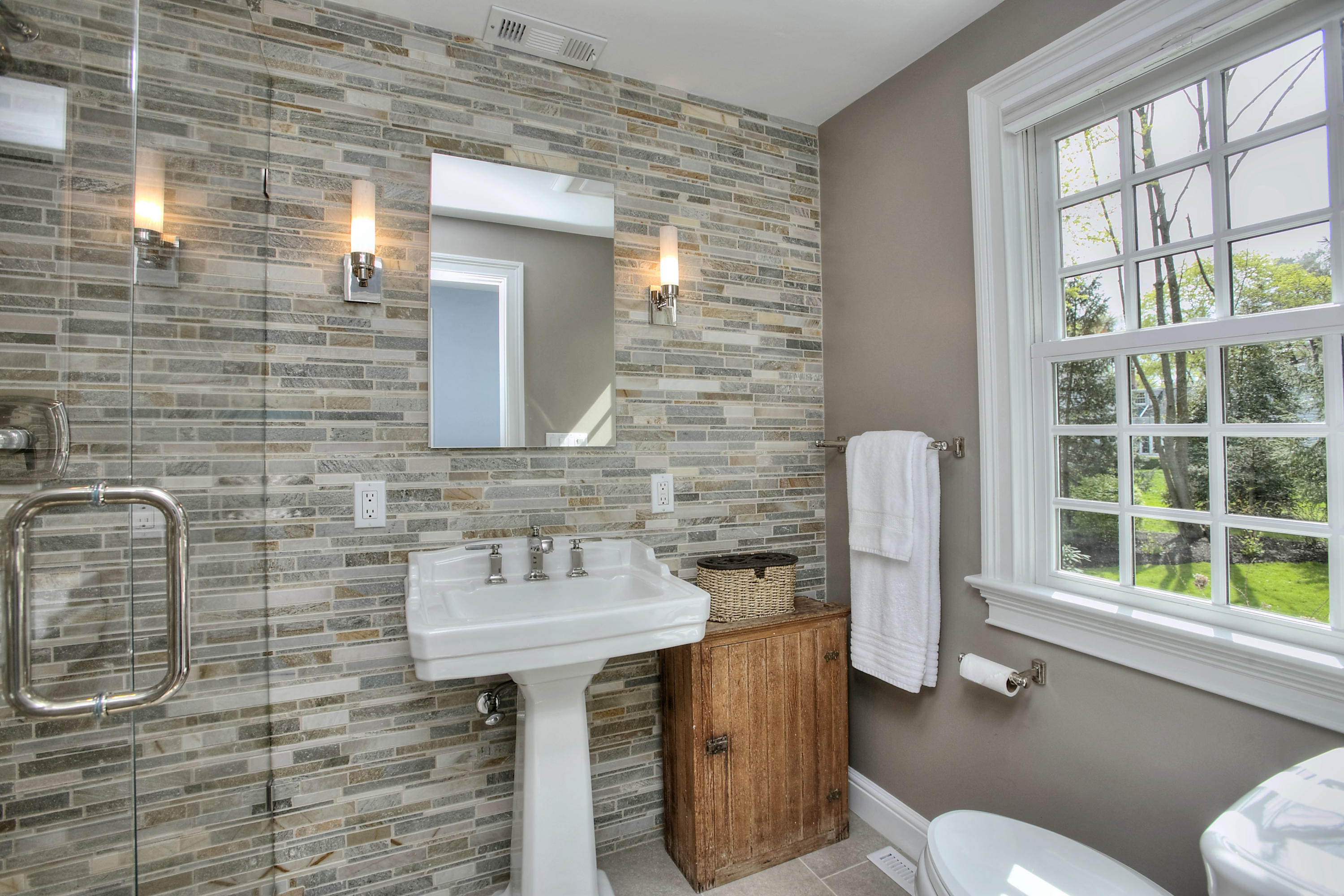 25 Point O Woods Road Darien, CT 06820 - Photo 34 of 68 a bathroom with a sink and a toilet