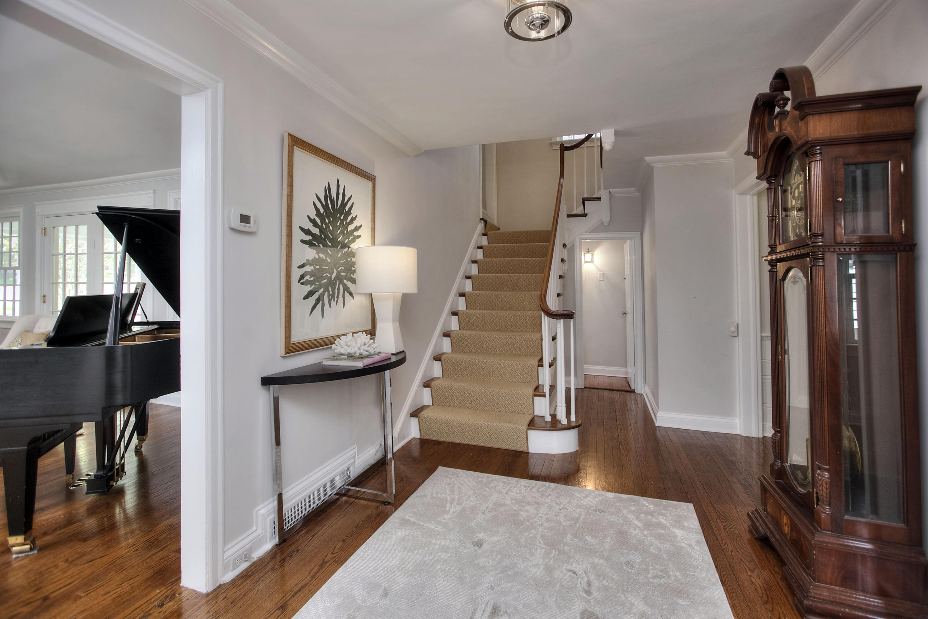 25 Point O Woods Road Darien, CT 06820 - Photo 4 of 68 a view of entryway and hall with wooden floor