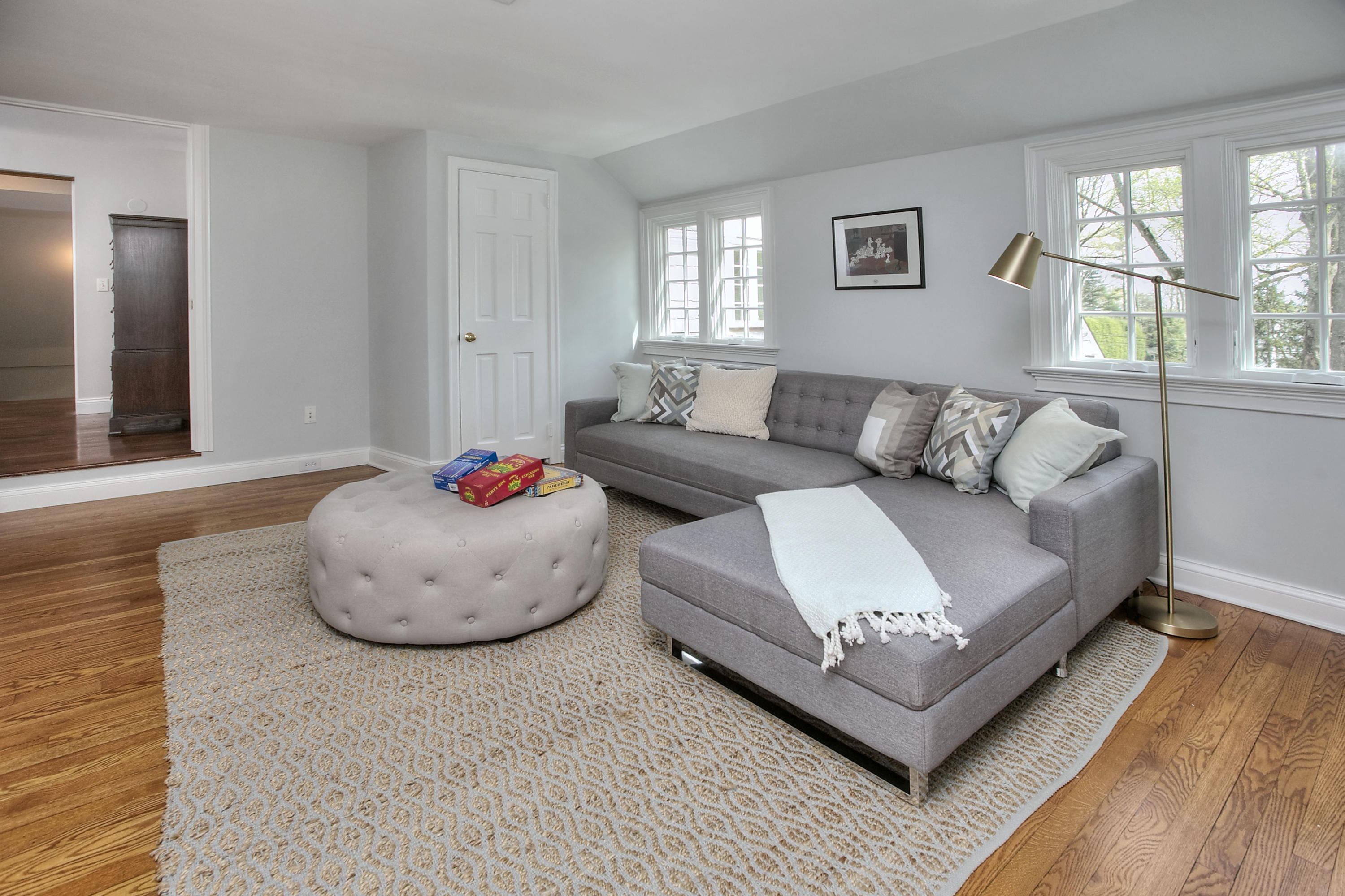 25 Point O Woods Road Darien, CT 06820 - Photo 41 of 68 a living room with furniture and a large window