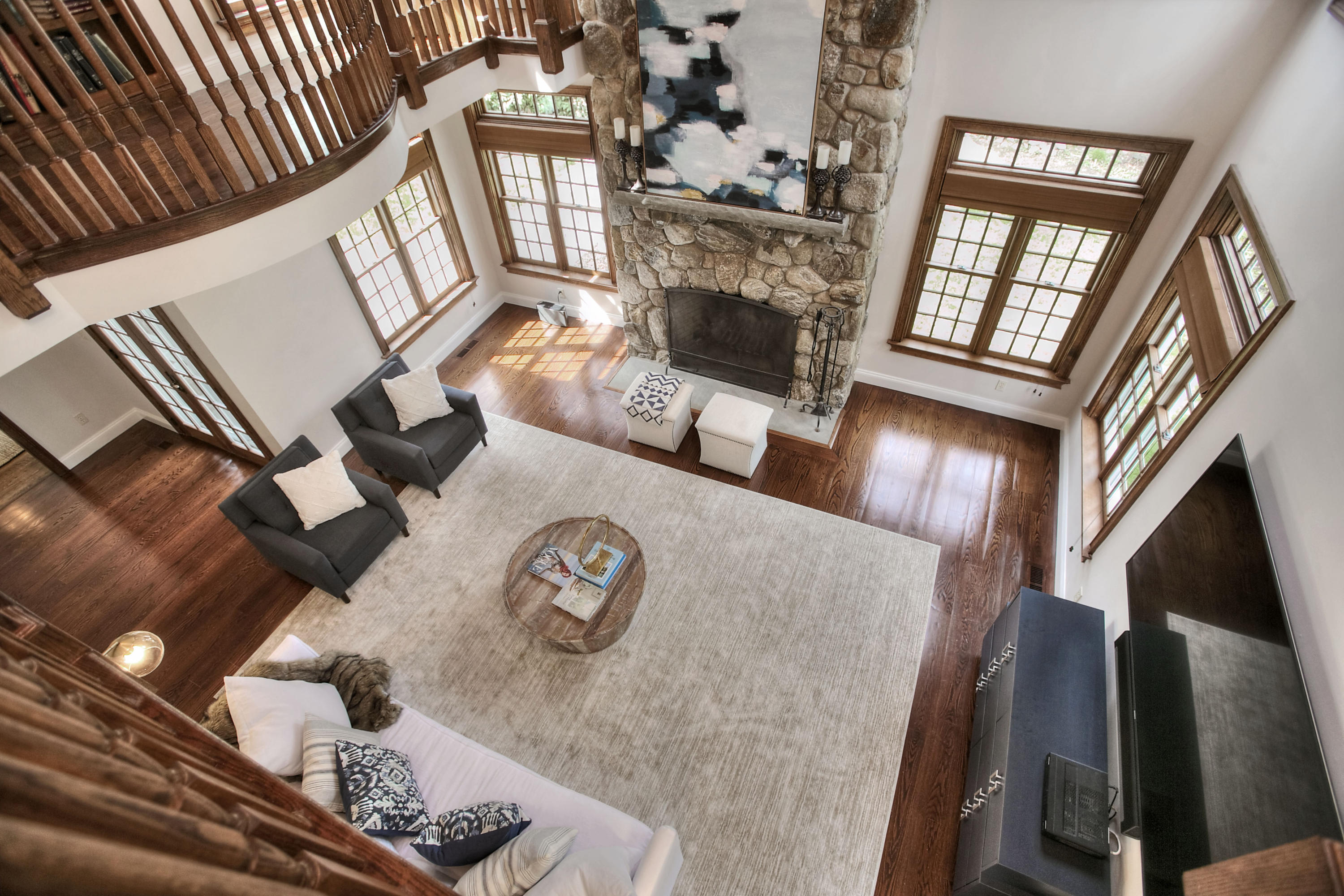 25 Point O Woods Road Darien, CT 06820 - Photo 48 of 68 a living room with furniture and a fireplace
