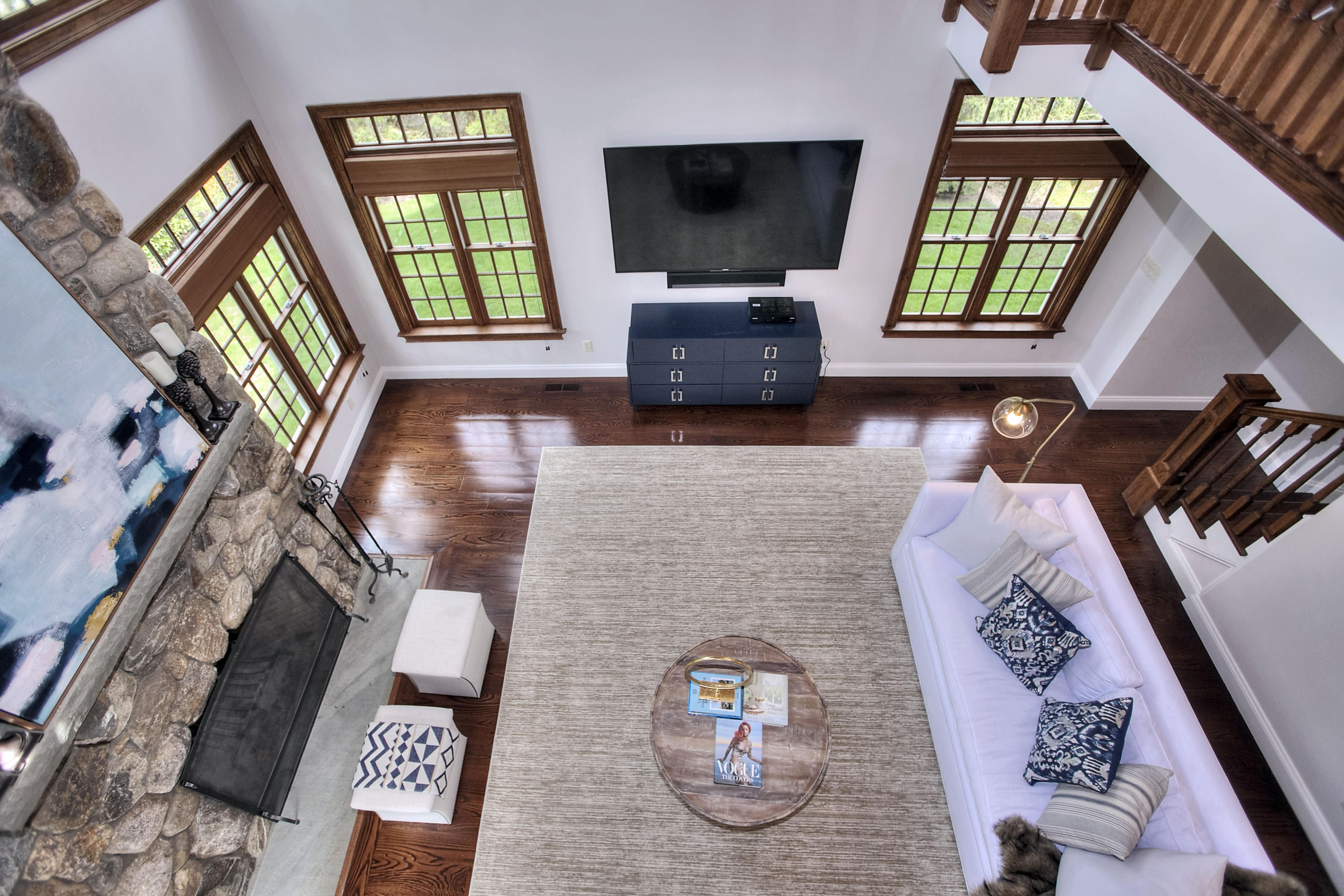 25 Point O Woods Road Darien, CT 06820 - Photo 51 of 68 a living room with furniture and a flat screen tv