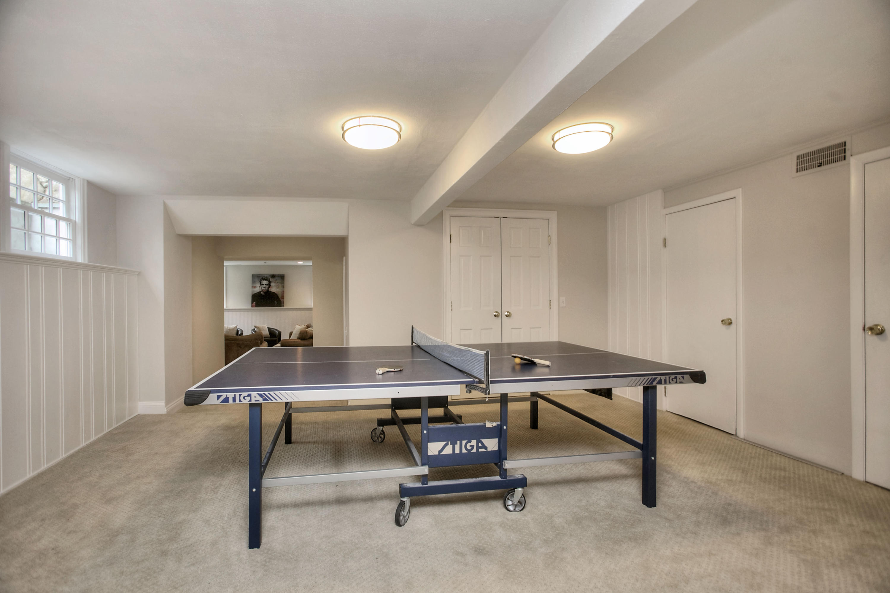 25 Point O Woods Road Darien, CT 06820 - Photo 58 of 68 a room with furniture pool table and window