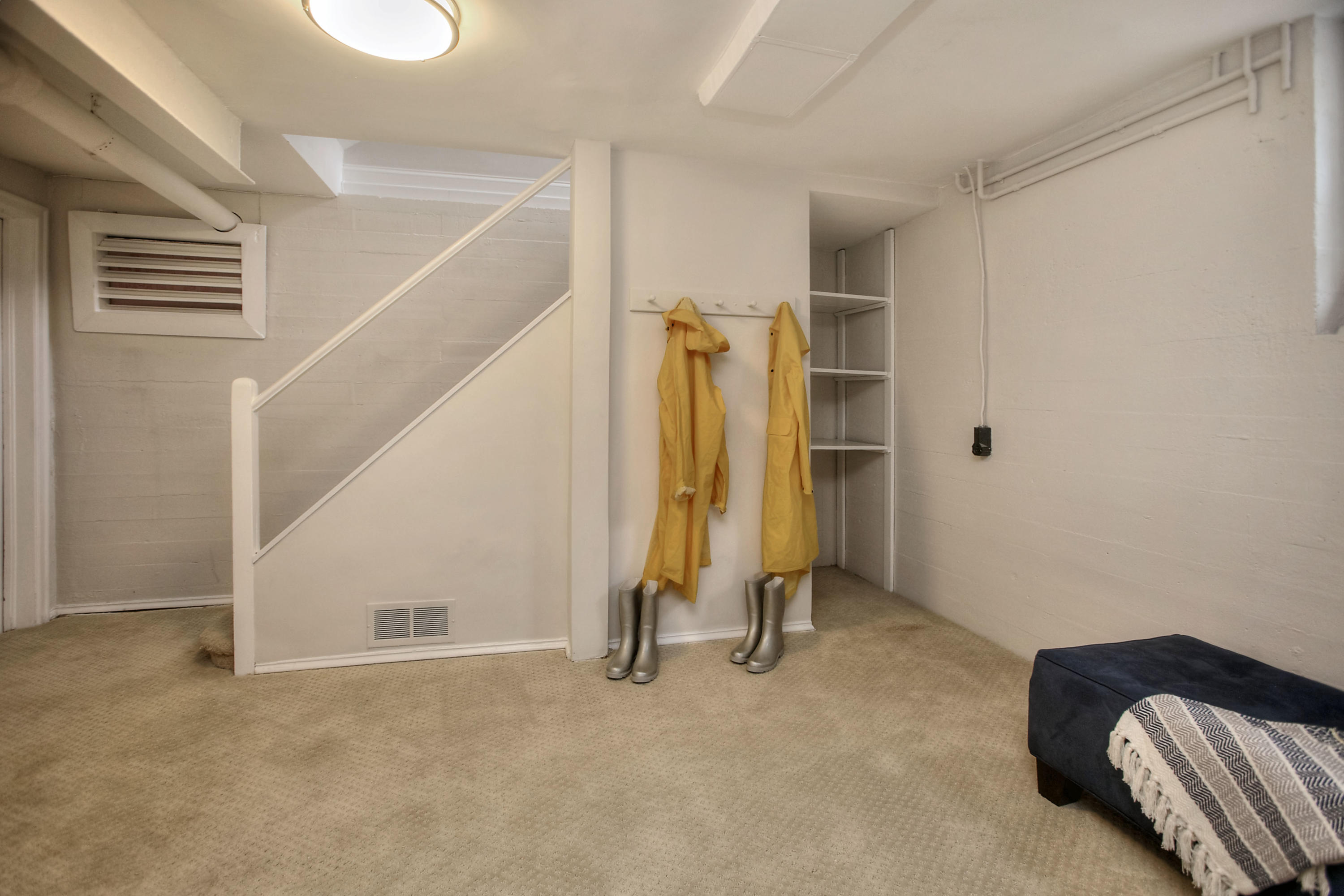 25 Point O Woods Road Darien, CT 06820 - Photo 59 of 68 a view of a livingroom with a staircase