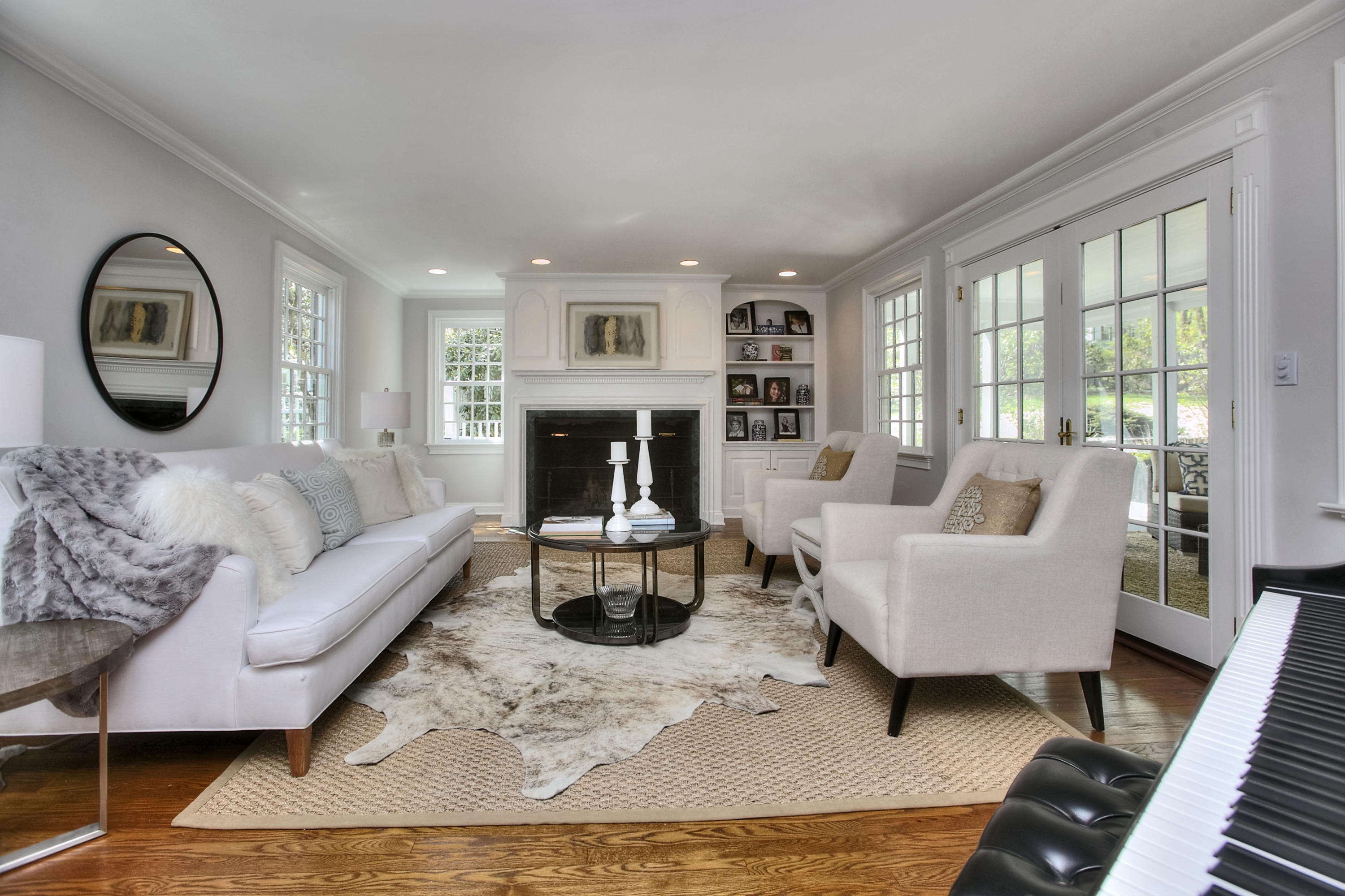 25 Point O Woods Road Darien, CT 06820 - Photo 6 of 68 a living room with furniture and a fireplace
