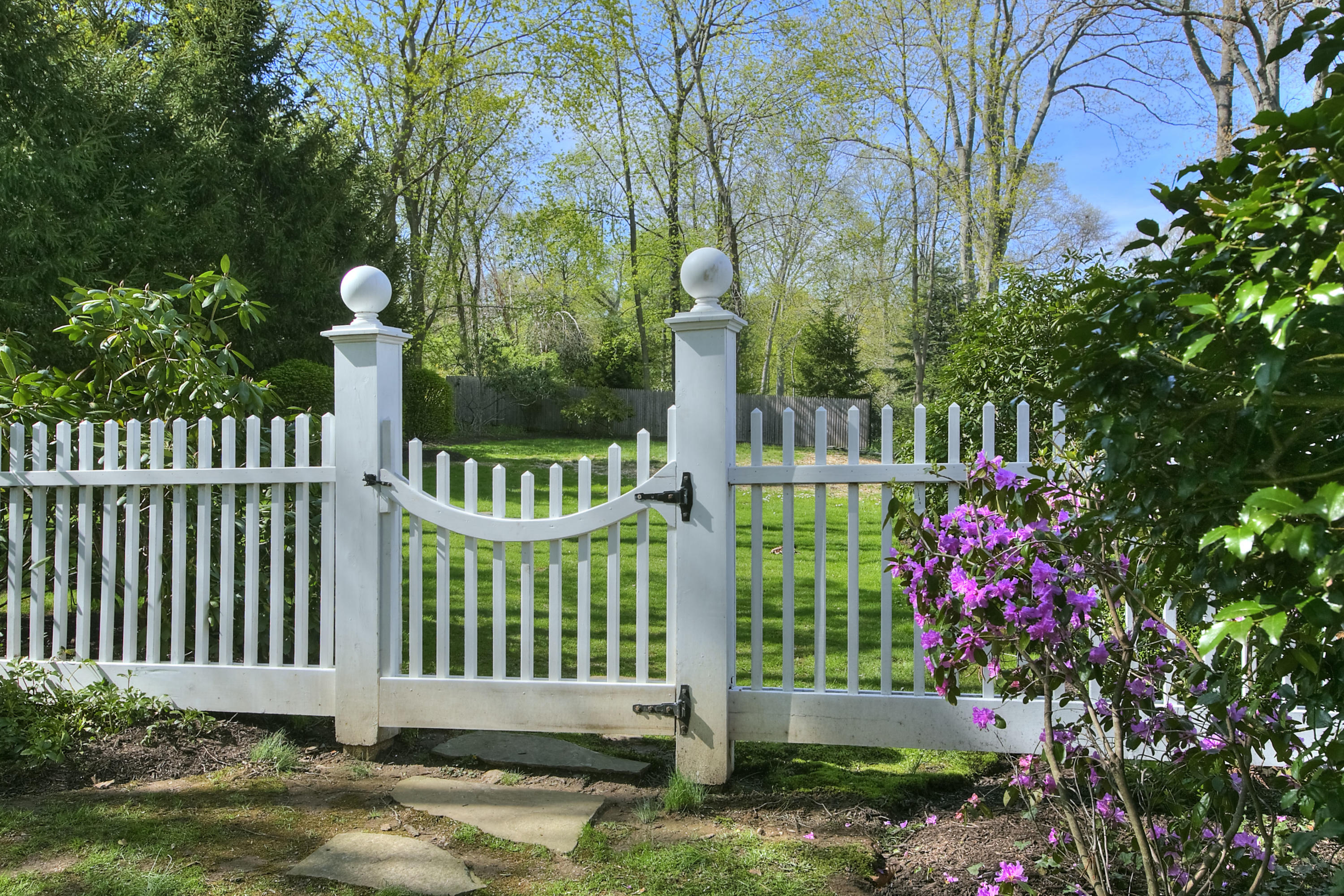 25 Point O Woods Road Darien, CT 06820 - Photo 63 of 68 a view of a house with a backyard and plants
