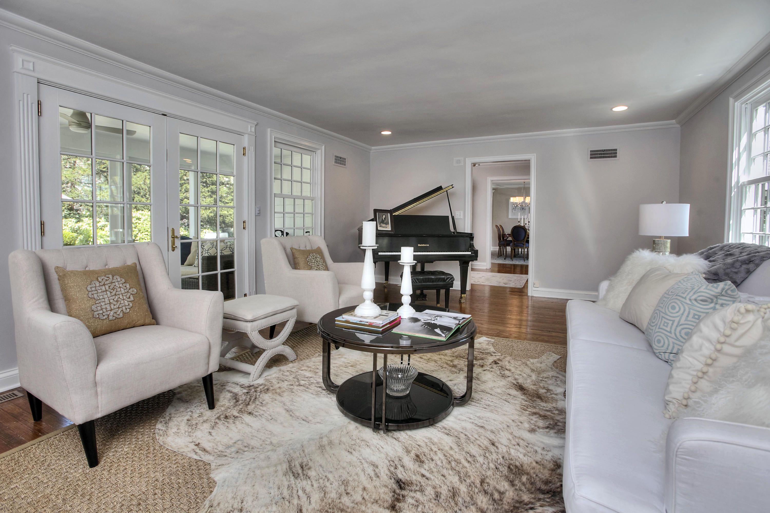 25 Point O Woods Road Darien, CT 06820 - Photo 7 of 68 a living room with furniture fireplace and a large window