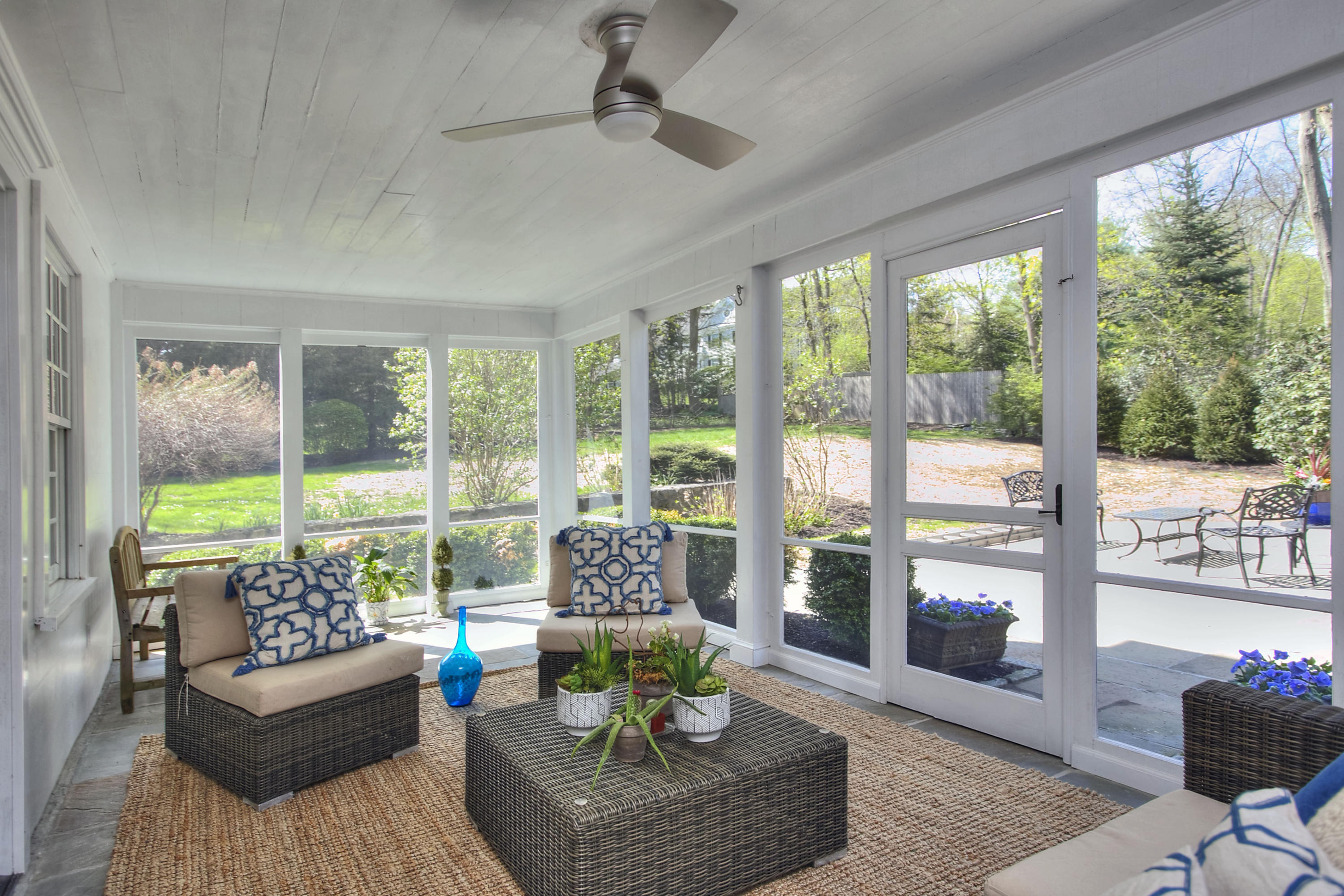 25 Point O Woods Road Darien, CT 06820 - Photo 9 of 68 a living room with furniture and a floor to ceiling window