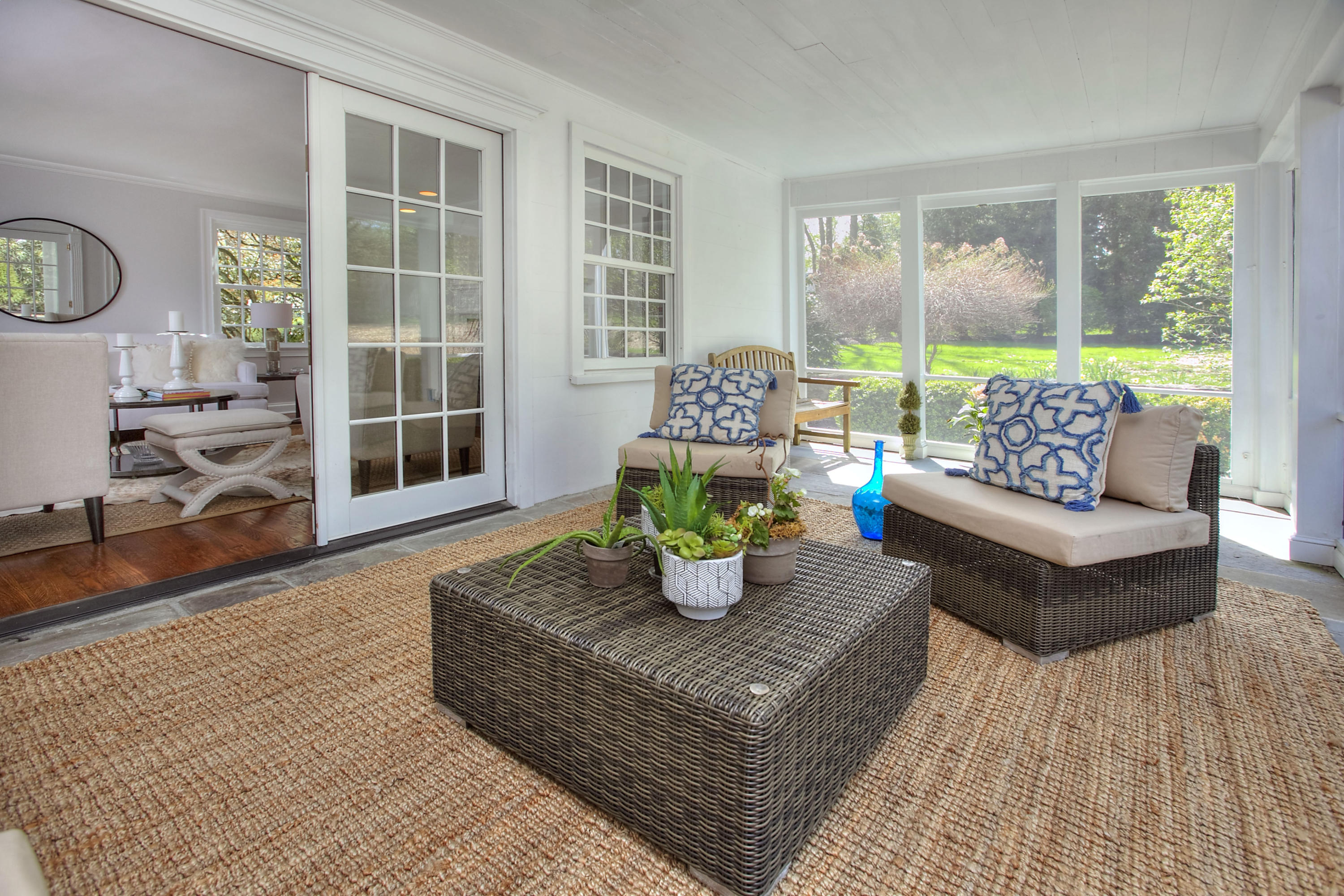 25 Point O Woods Road Darien, CT 06820 - Photo 10 of 68 a living room with furniture and large windows