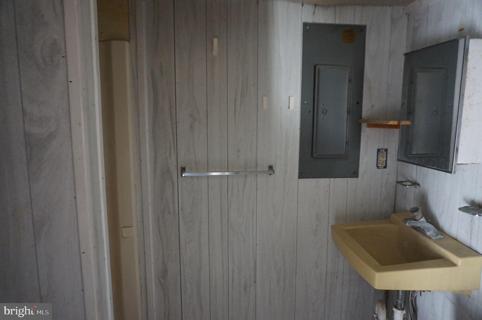103 Chambers Street Preston, MD 21655 - Photo 11 of 12 a bathroom with a sink and a toilet