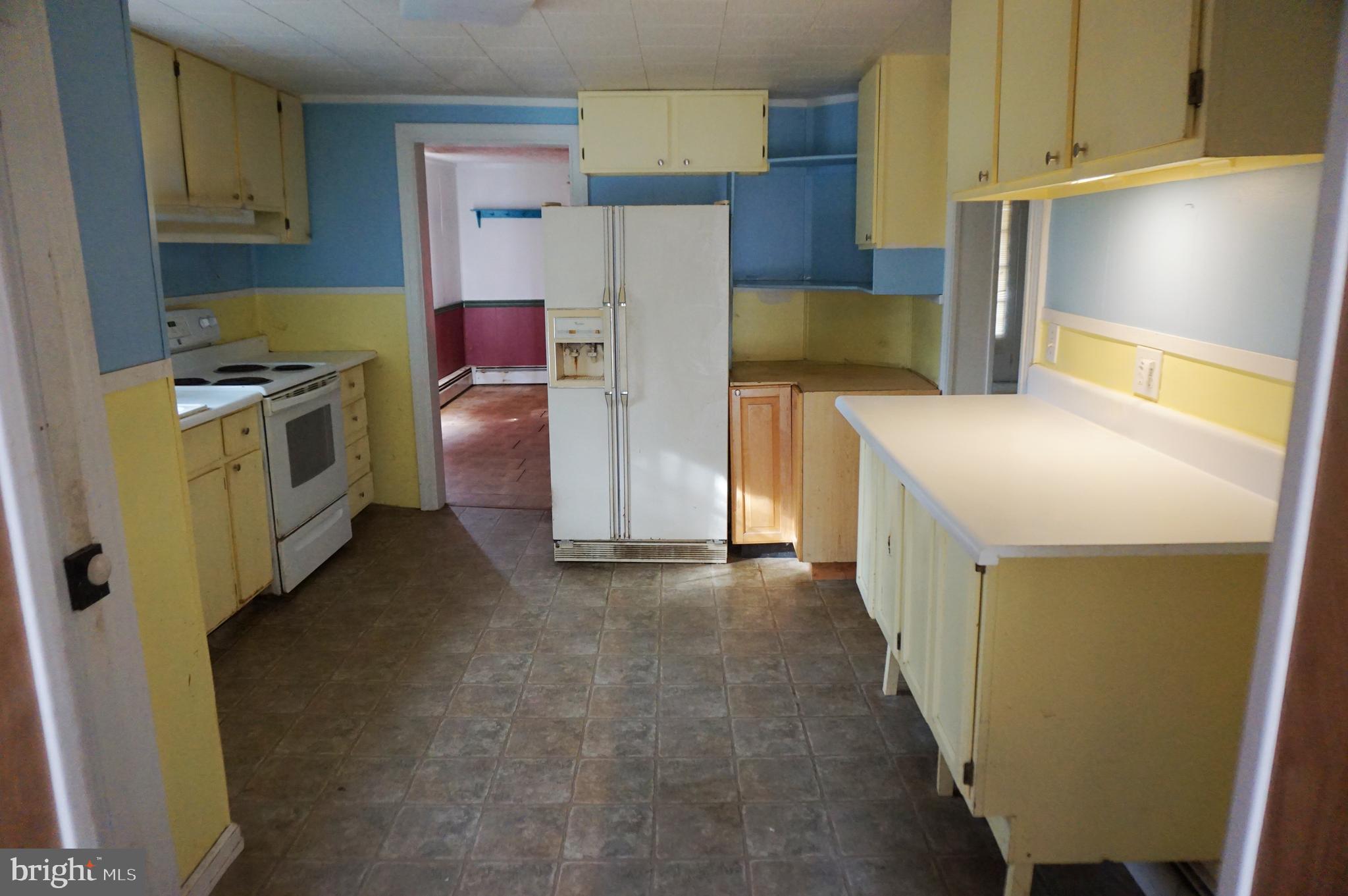 103 Chambers Street Preston, MD 21655 - Photo 4 of 12 a utility room with dryer and washer