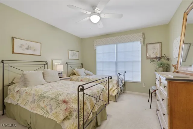 a bed room with furniture and a chandelier