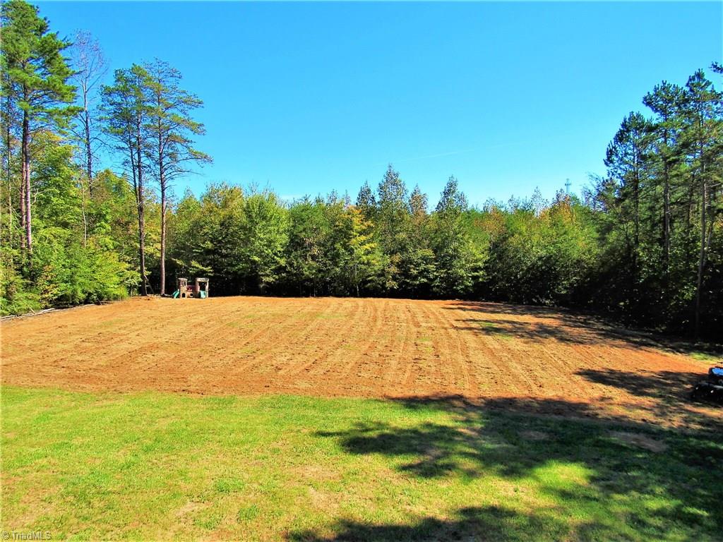 310 Merrells Lake Road Mocksville, NC 27028 - Photo 26 of 26 Backyard - just regraded for grass and reseeded.