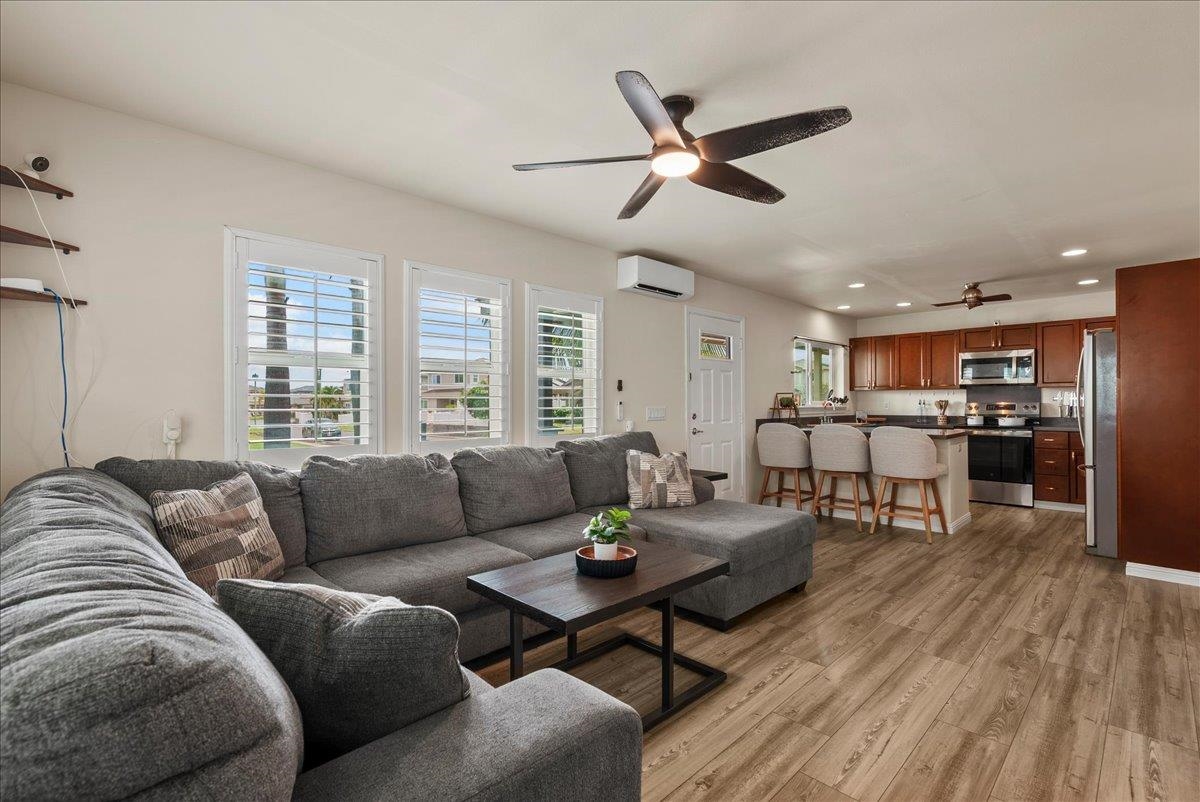 214 Alake Street Kahului, HI 96732 - Photo 11 of 27 a living room with furniture and wooden floor