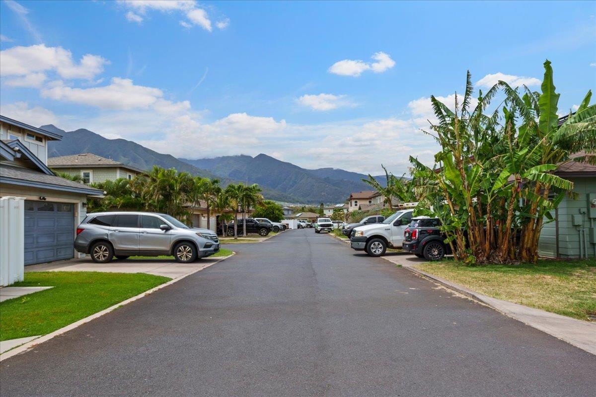 214 Alake Street Kahului, HI 96732 - Photo 2 of 27 a view of a street with a car parked in front of it