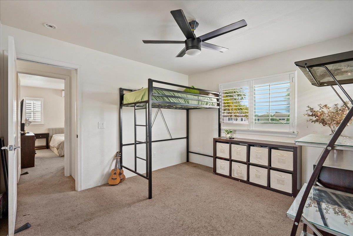 214 Alake Street Kahului, HI 96732 - Photo 24 of 27 a view of entryway with a window and a ceiling fan