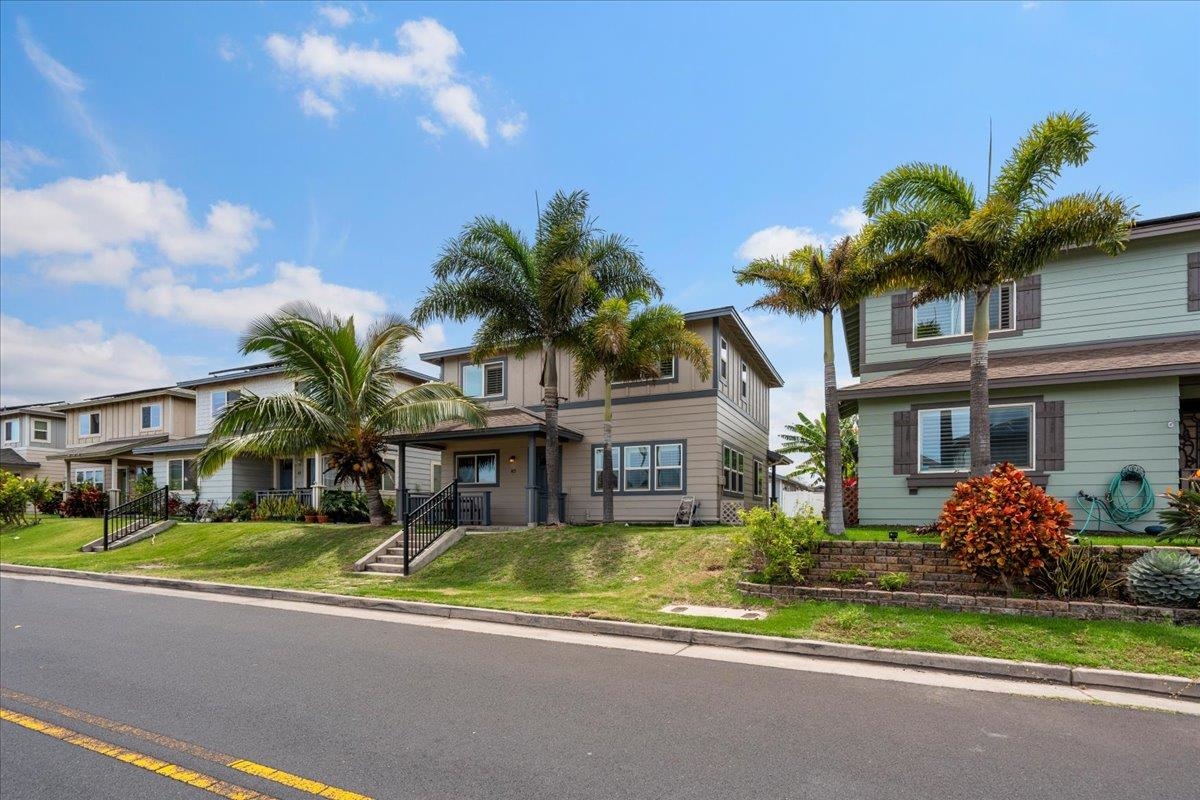 214 Alake Street Kahului, HI 96732 - Photo 25 of 27 a house view with a swimming pool and a yard