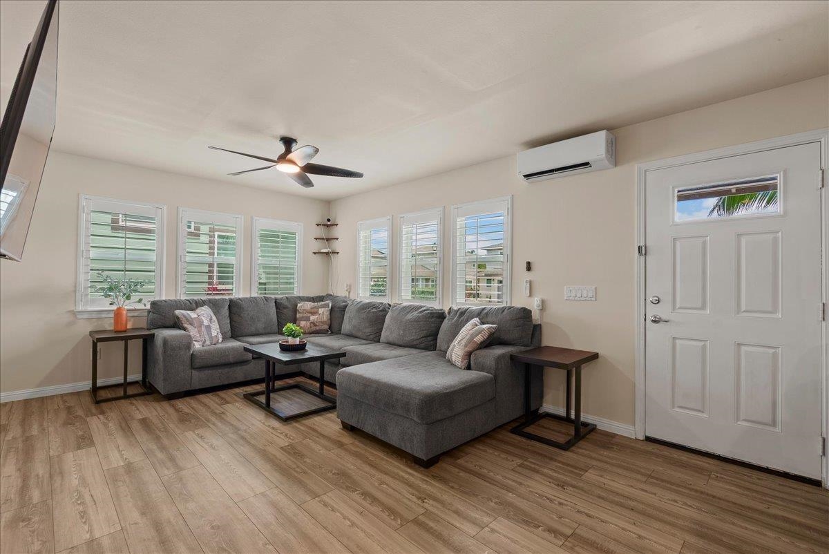 214 Alake Street Kahului, HI 96732 - Photo 8 of 27 a living room with furniture and a large window