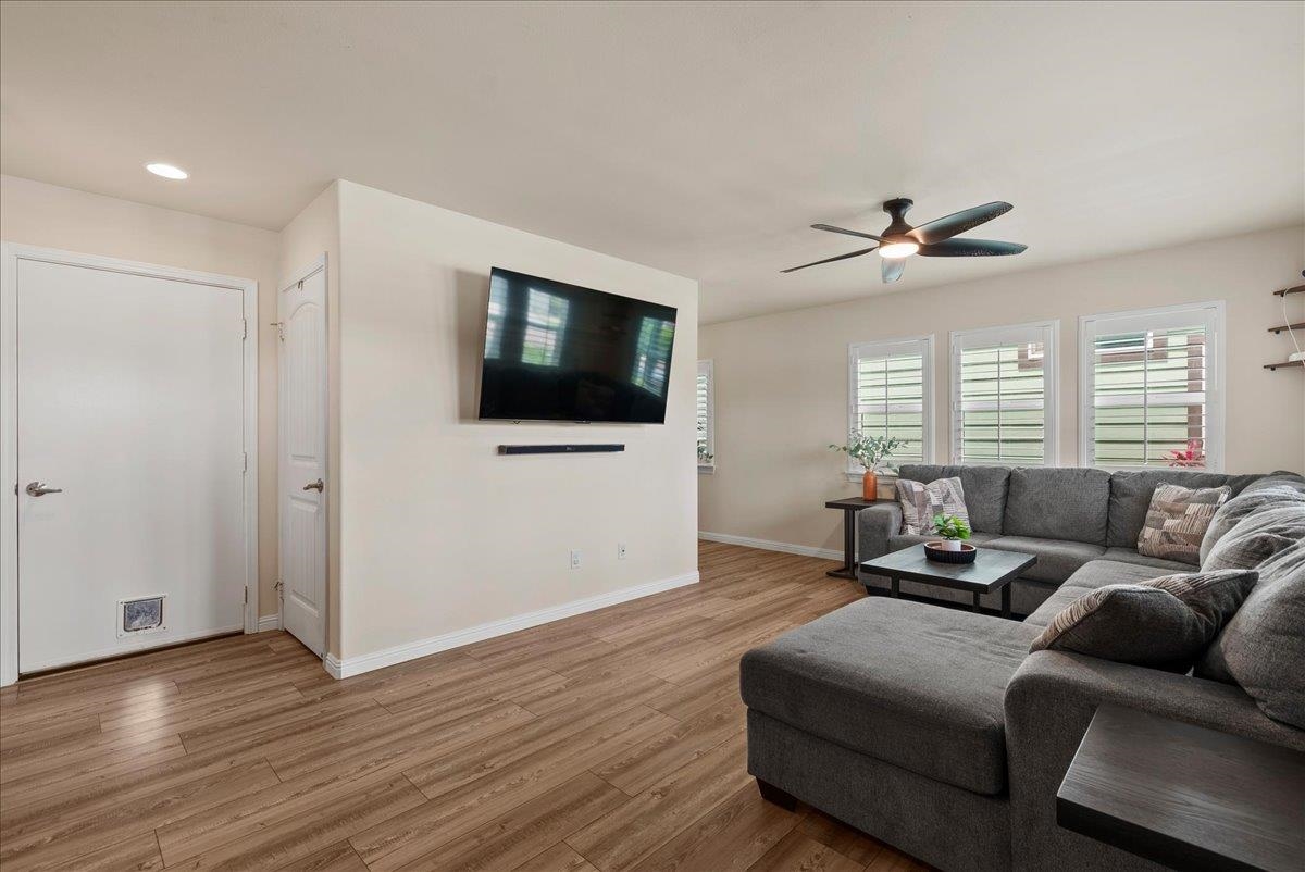 214 Alake Street Kahului, HI 96732 - Photo 10 of 27 a living room with furniture and a flat screen tv