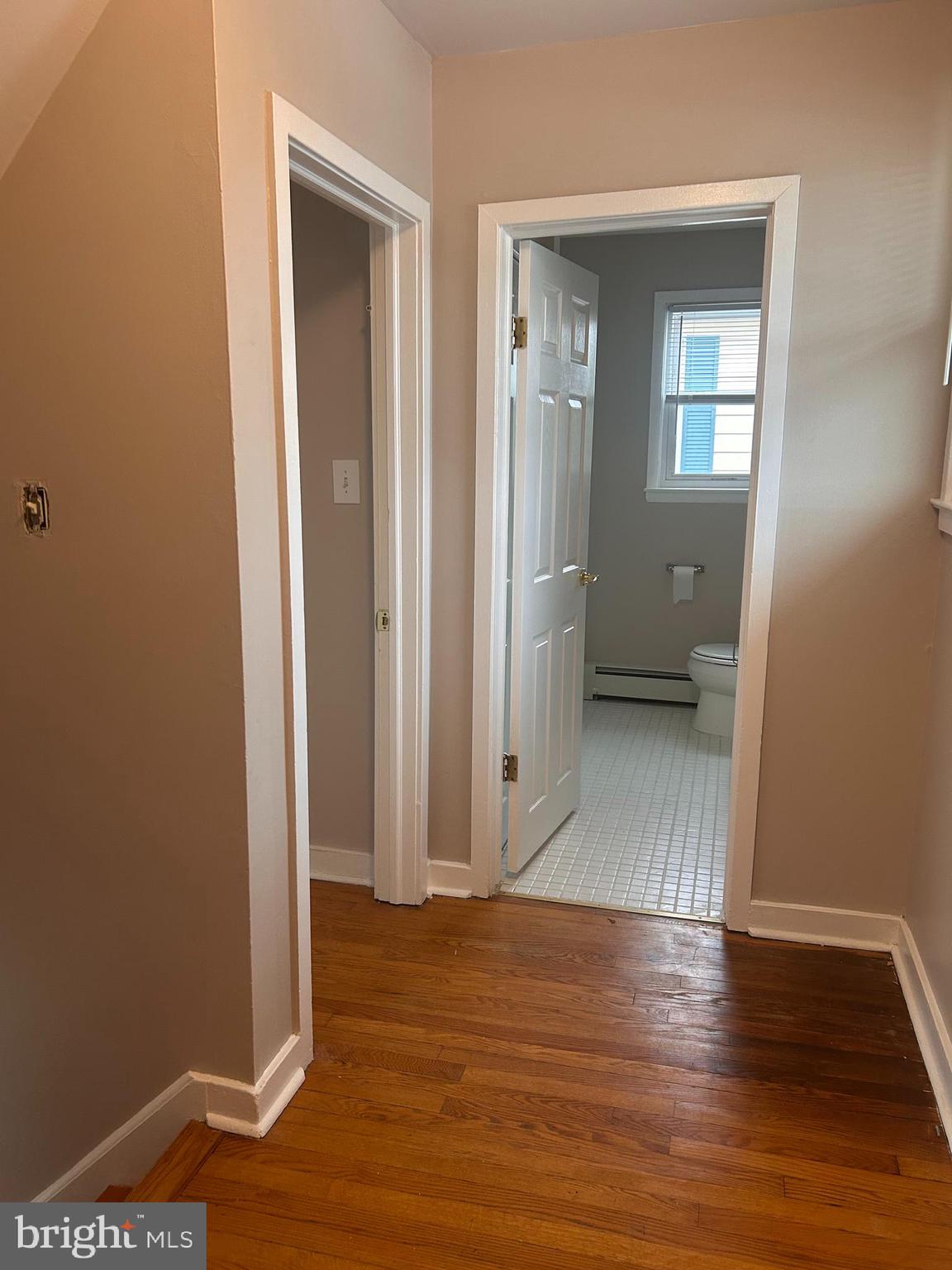 300 Evesham Avenue West Magnolia, NJ 08049 - Photo 25 of 25 a view of a room with wooden floor and a bathroom